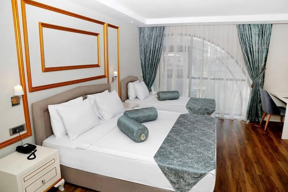 Photo of the whole room, Bed in Kubaliç Hotel