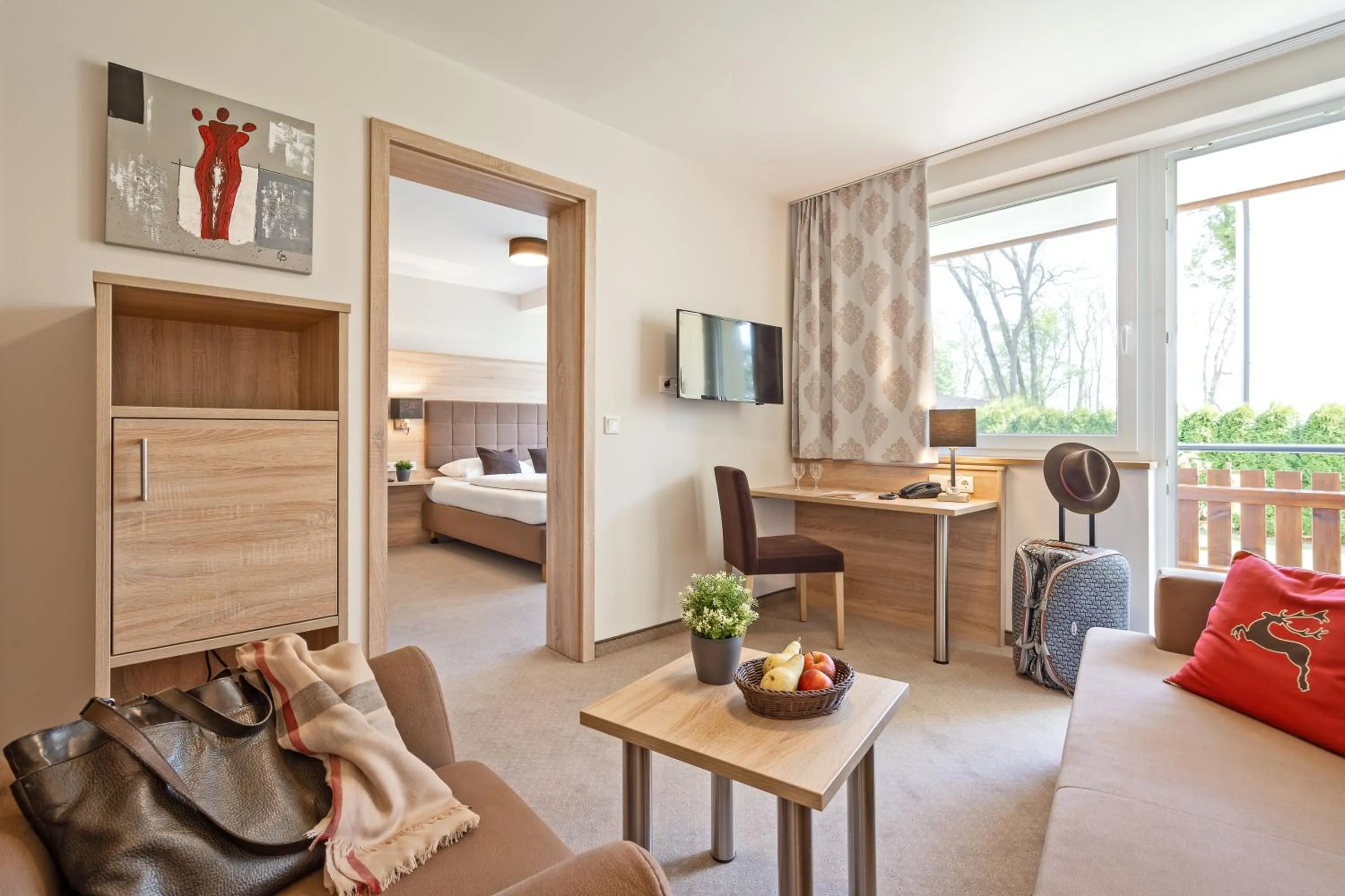 Living room, Bed in Richstein's Posthotel