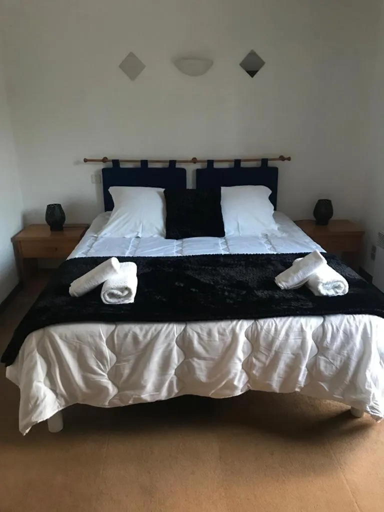 Bed in HUMAN HOTEL RESTAURANT Park