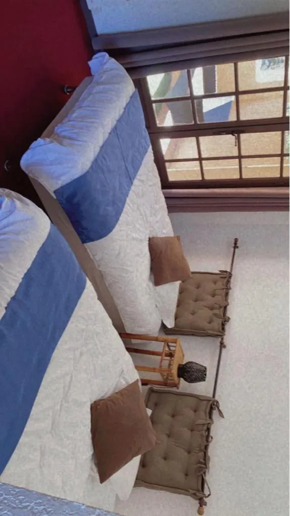 Bed in HUMAN HOTEL RESTAURANT Park