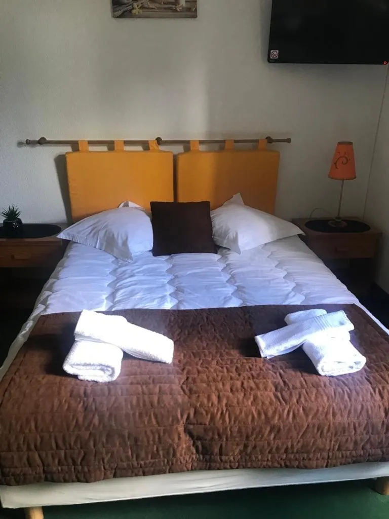 Bed in HUMAN HOTEL RESTAURANT Park