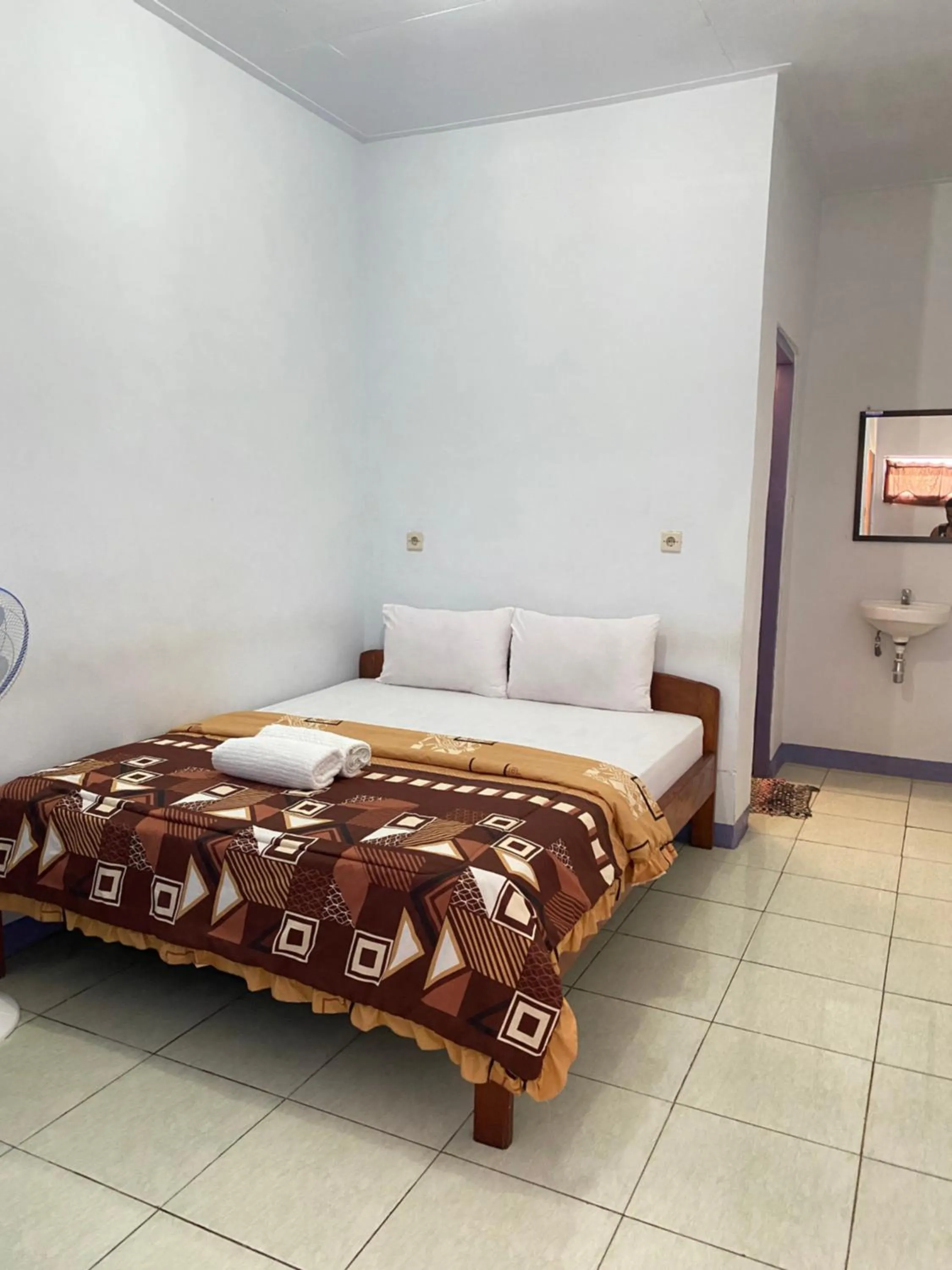 Bed in Mahoni Guest House