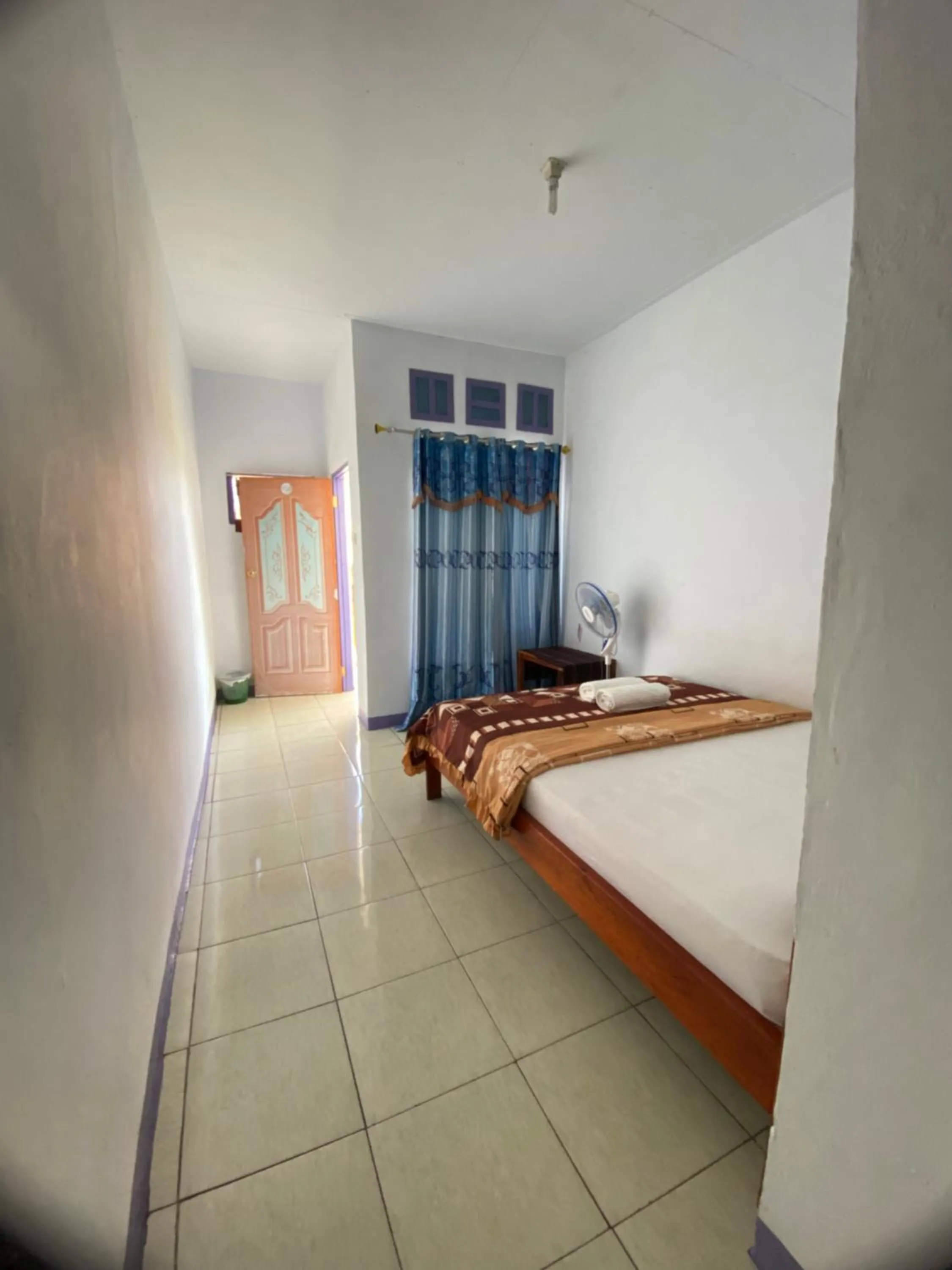 Bed in Mahoni Guest House