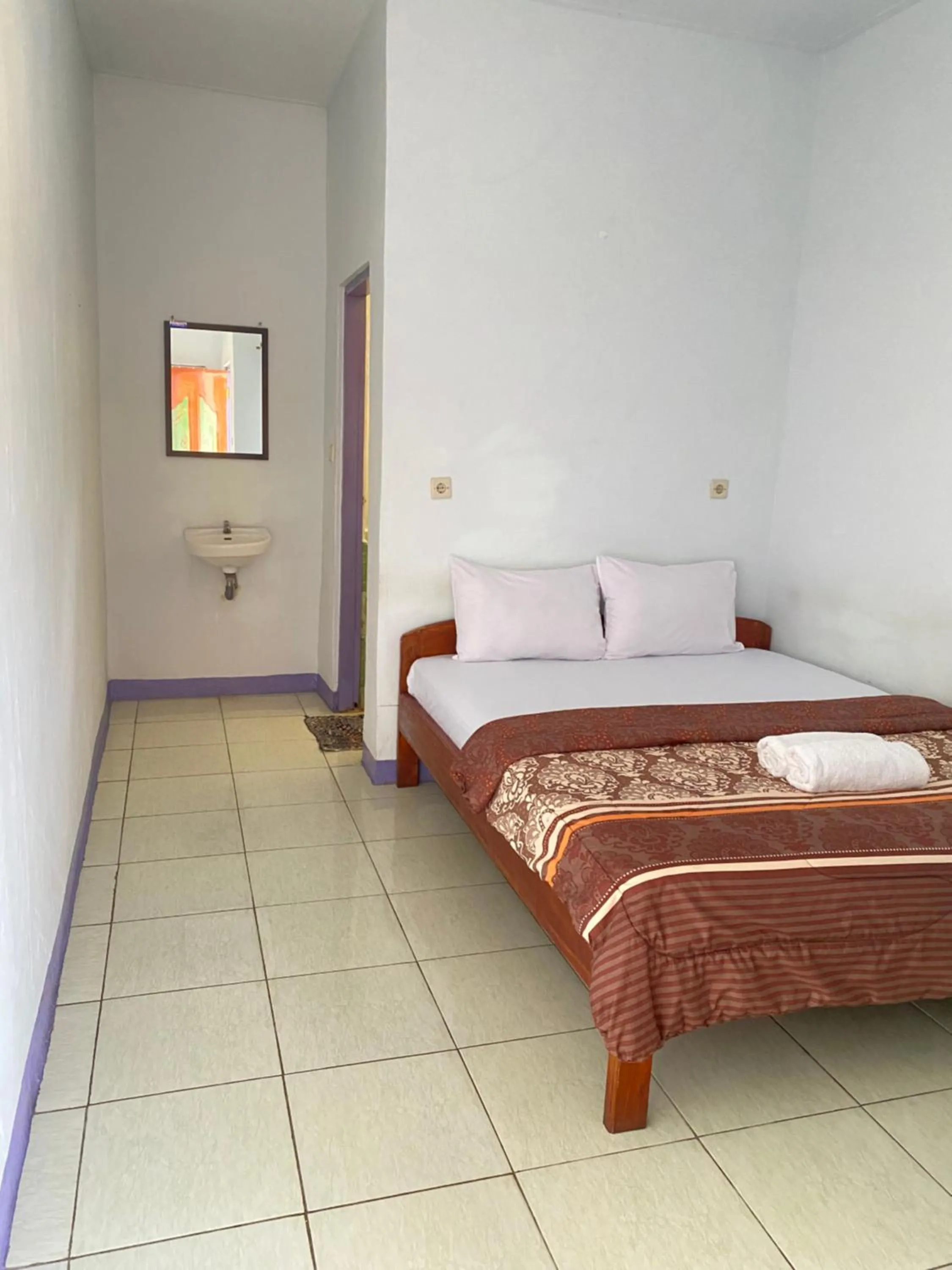 Bed in Mahoni Guest House