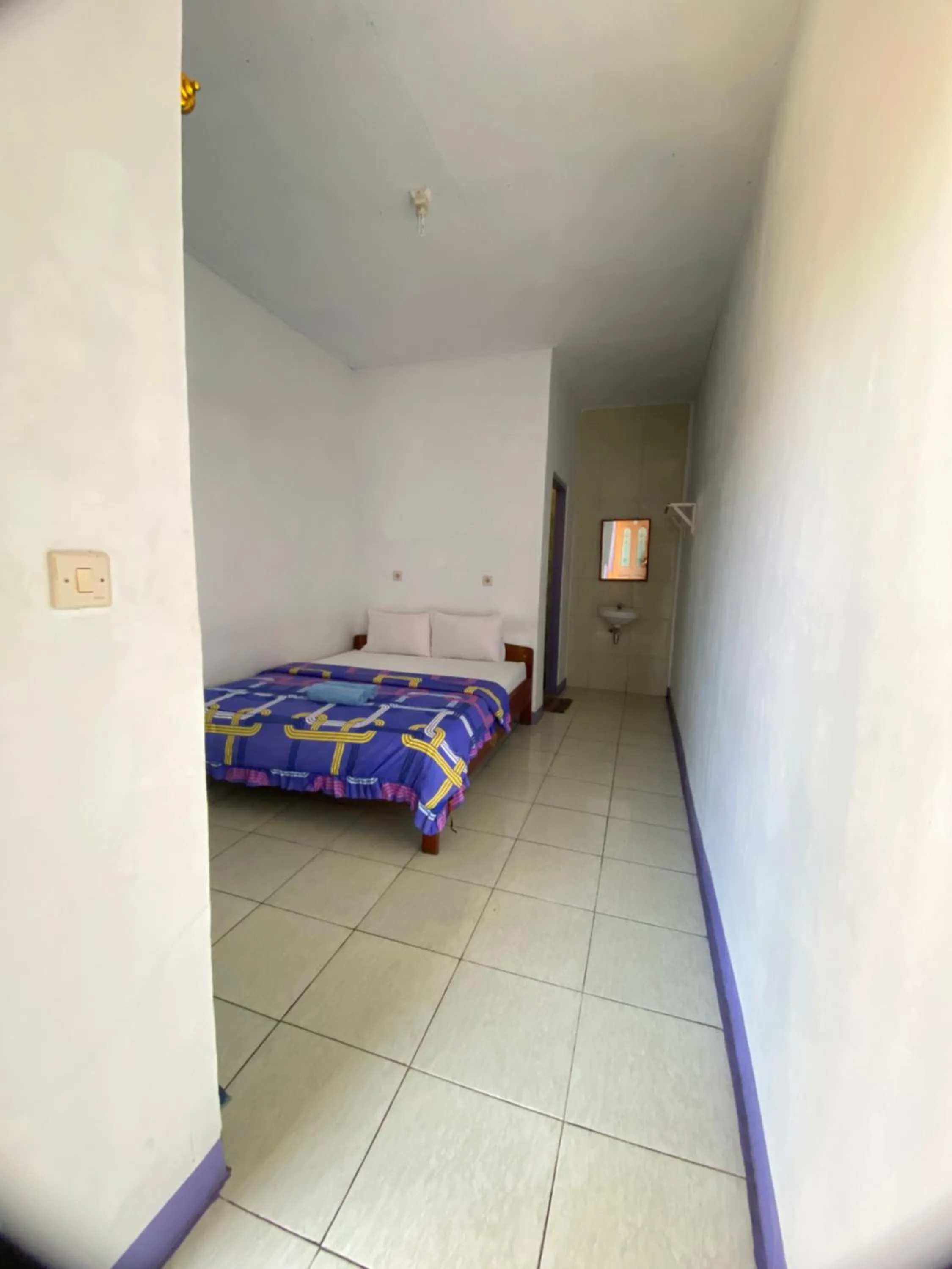 Bed in Mahoni Guest House