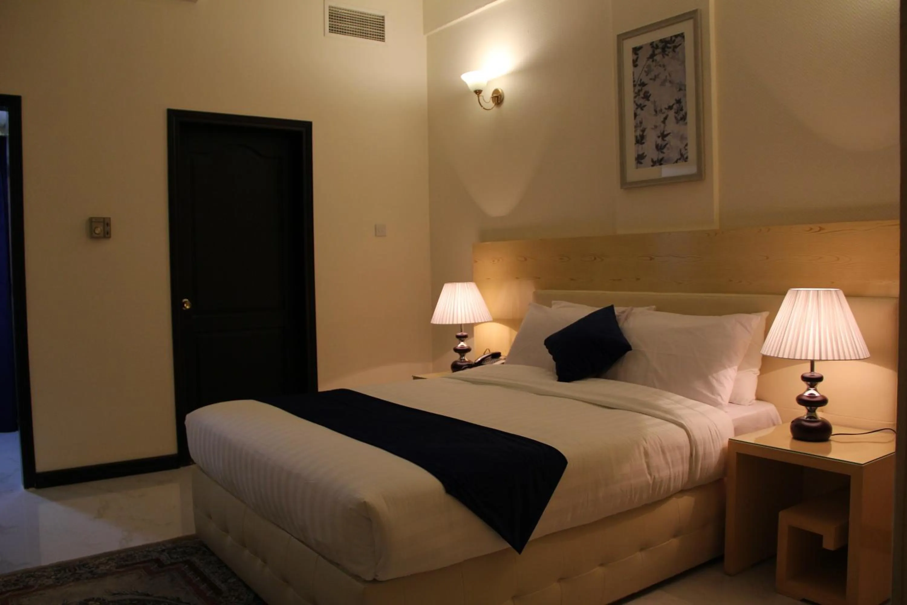 Bed in Bahrain International Hotel