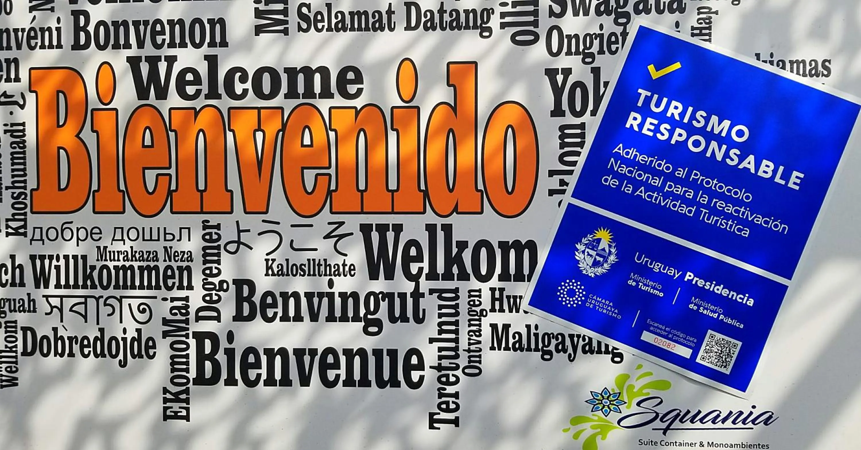 Property logo or sign in Squania Suite Container & Monoambientes