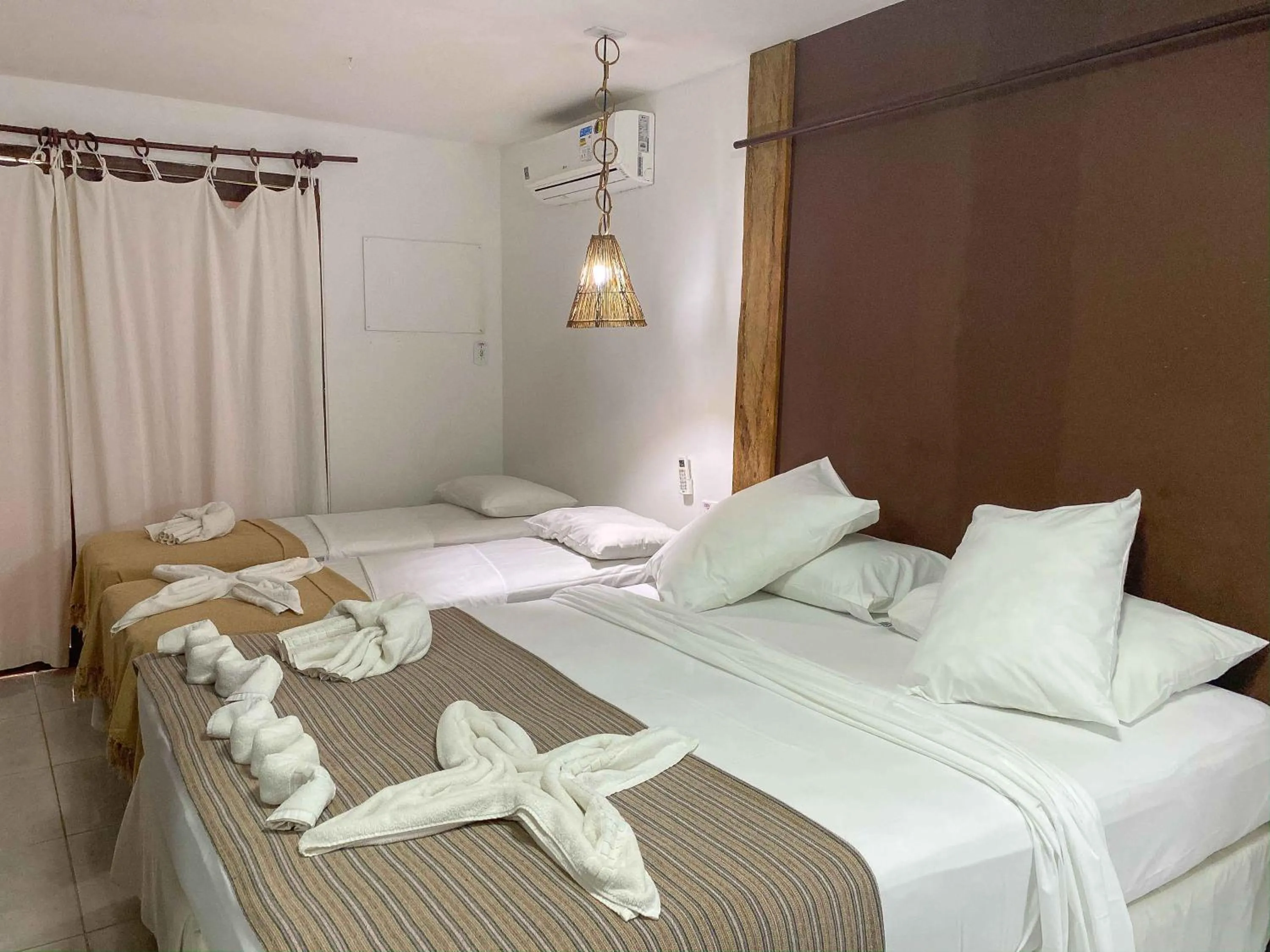 Bed in Pousada Barra Velha