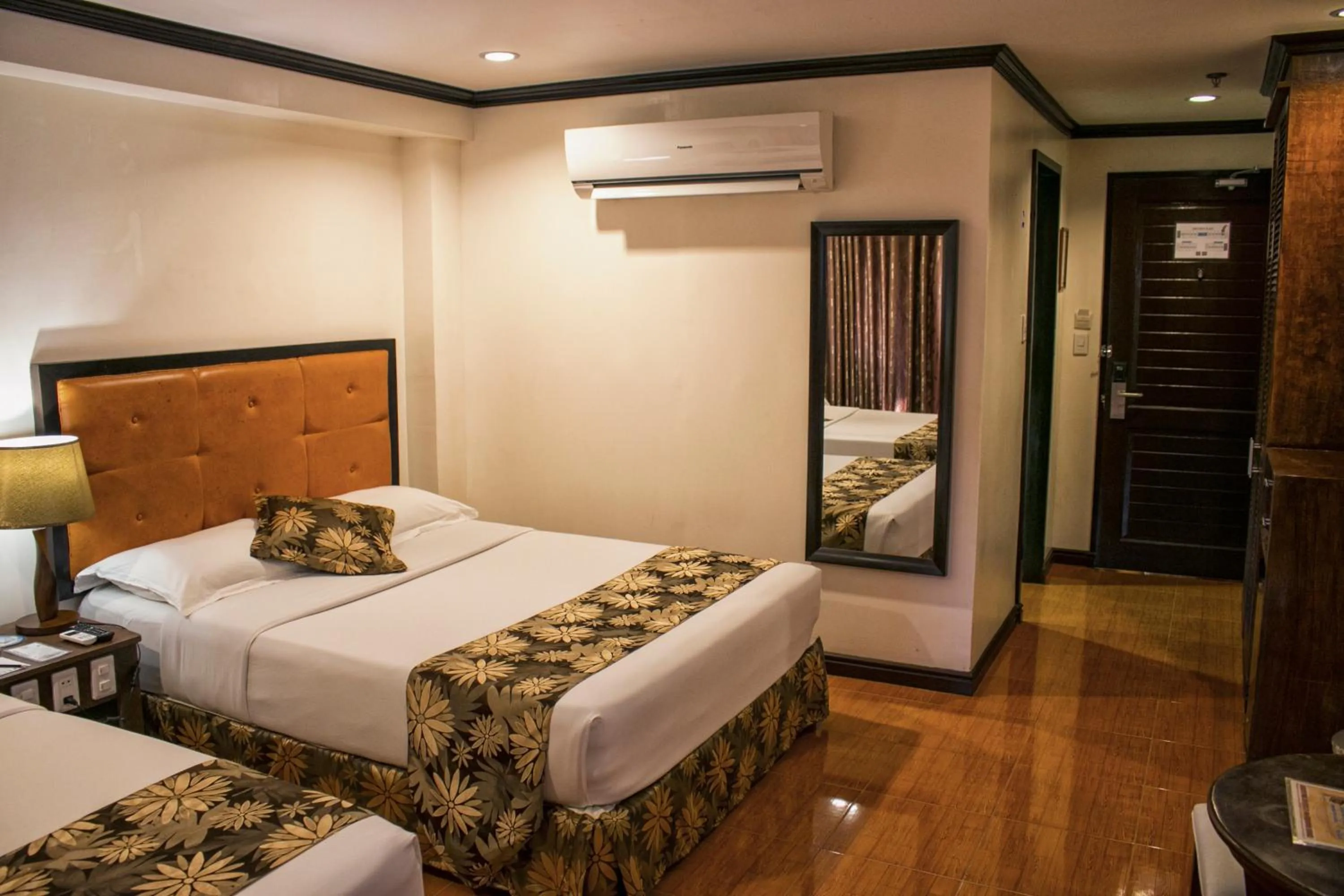 Photo of the whole room, Bed in Paradise Garden Hotel and Convention Center Boracay Powered by ASTON
