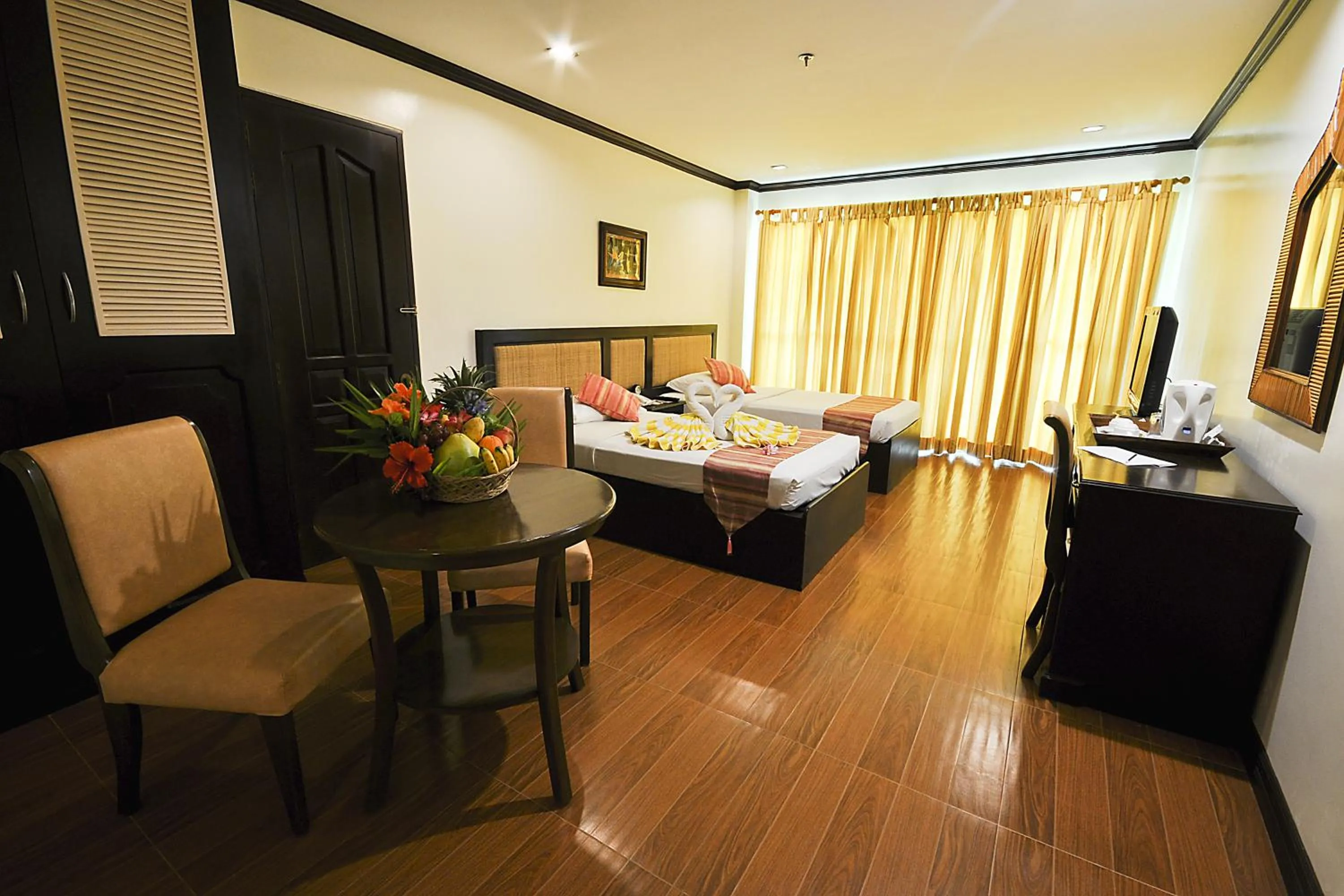 Photo of the whole room, Bed in Paradise Garden Hotel and Convention Center Boracay Powered by ASTON