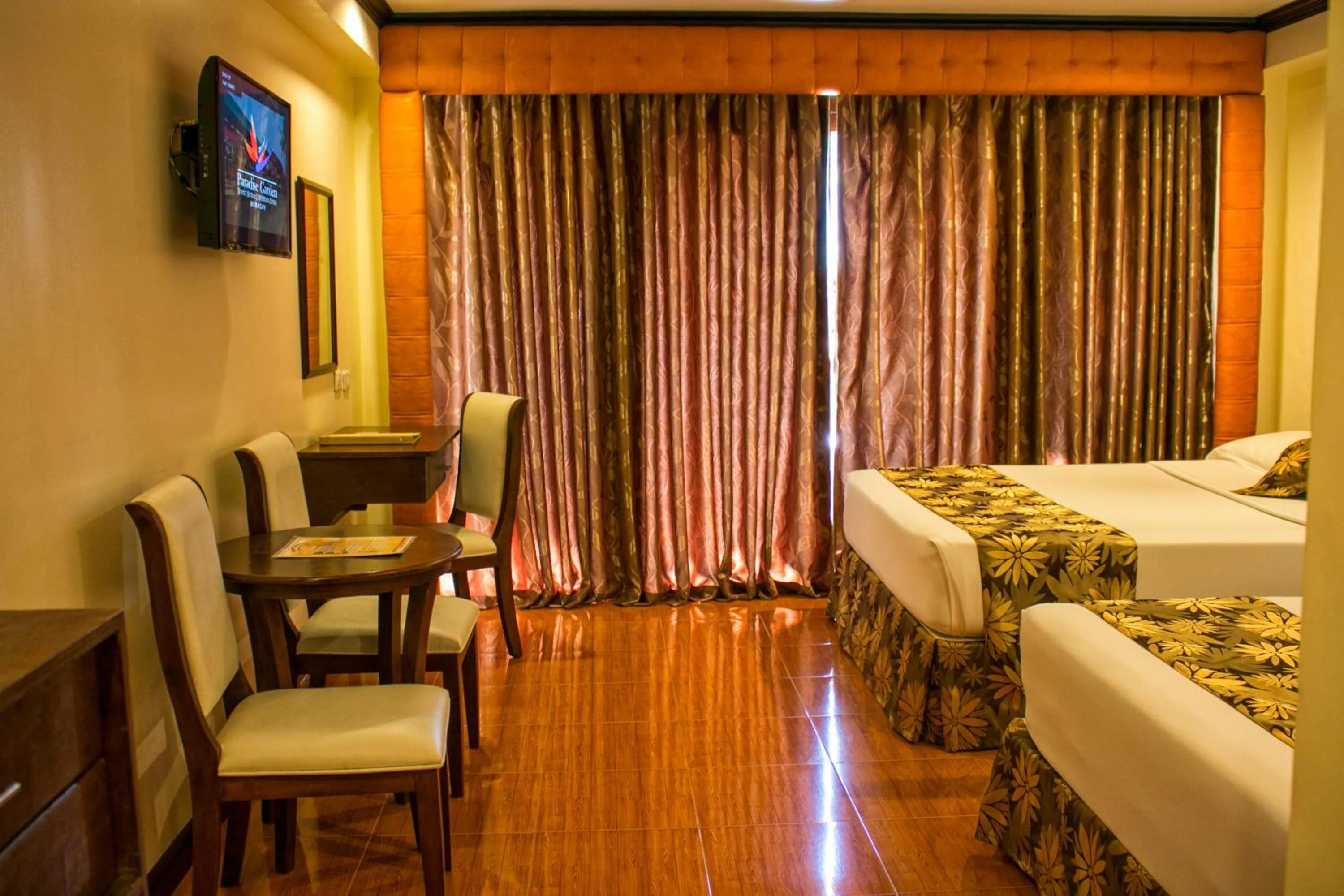 Photo of the whole room, Bed in Paradise Garden Hotel and Convention Center Boracay Powered by ASTON