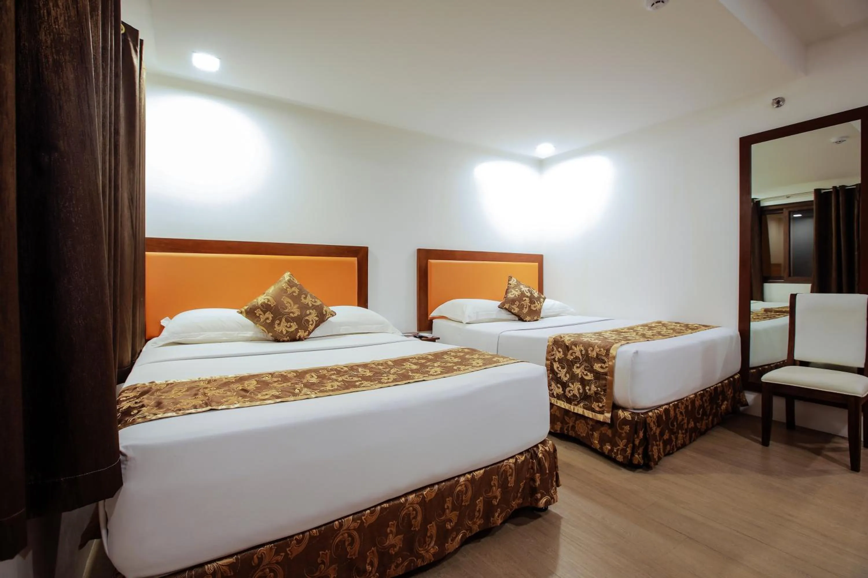 Photo of the whole room, Bed in Paradise Garden Hotel and Convention Center Boracay Powered by ASTON