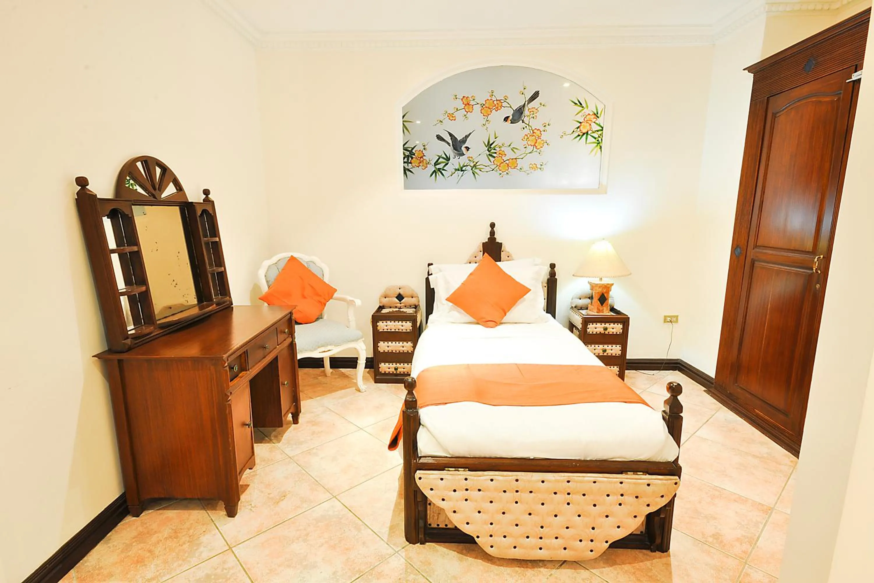 Photo of the whole room, Bed in Paradise Garden Hotel and Convention Center Boracay Powered by ASTON