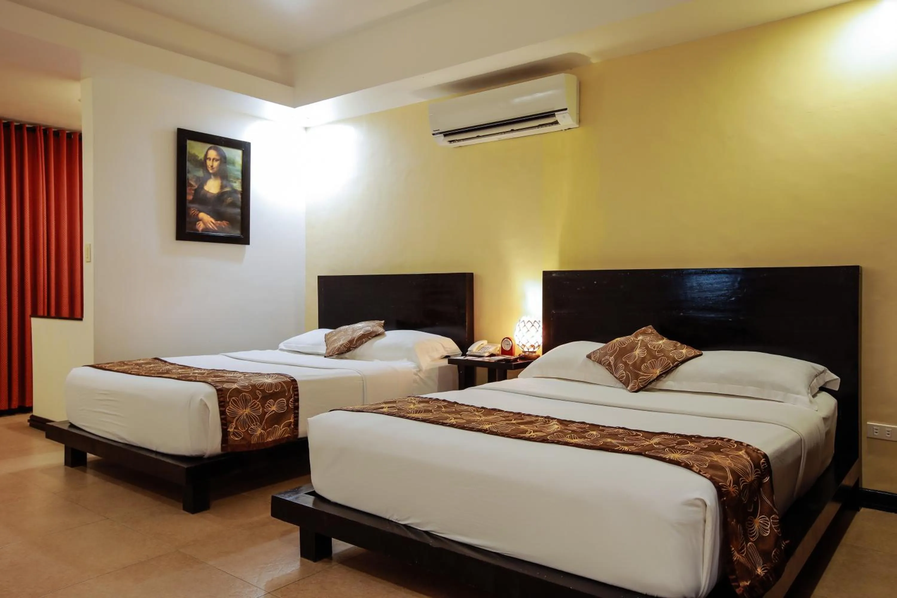 Photo of the whole room, Bed in Paradise Garden Hotel and Convention Center Boracay Powered by ASTON