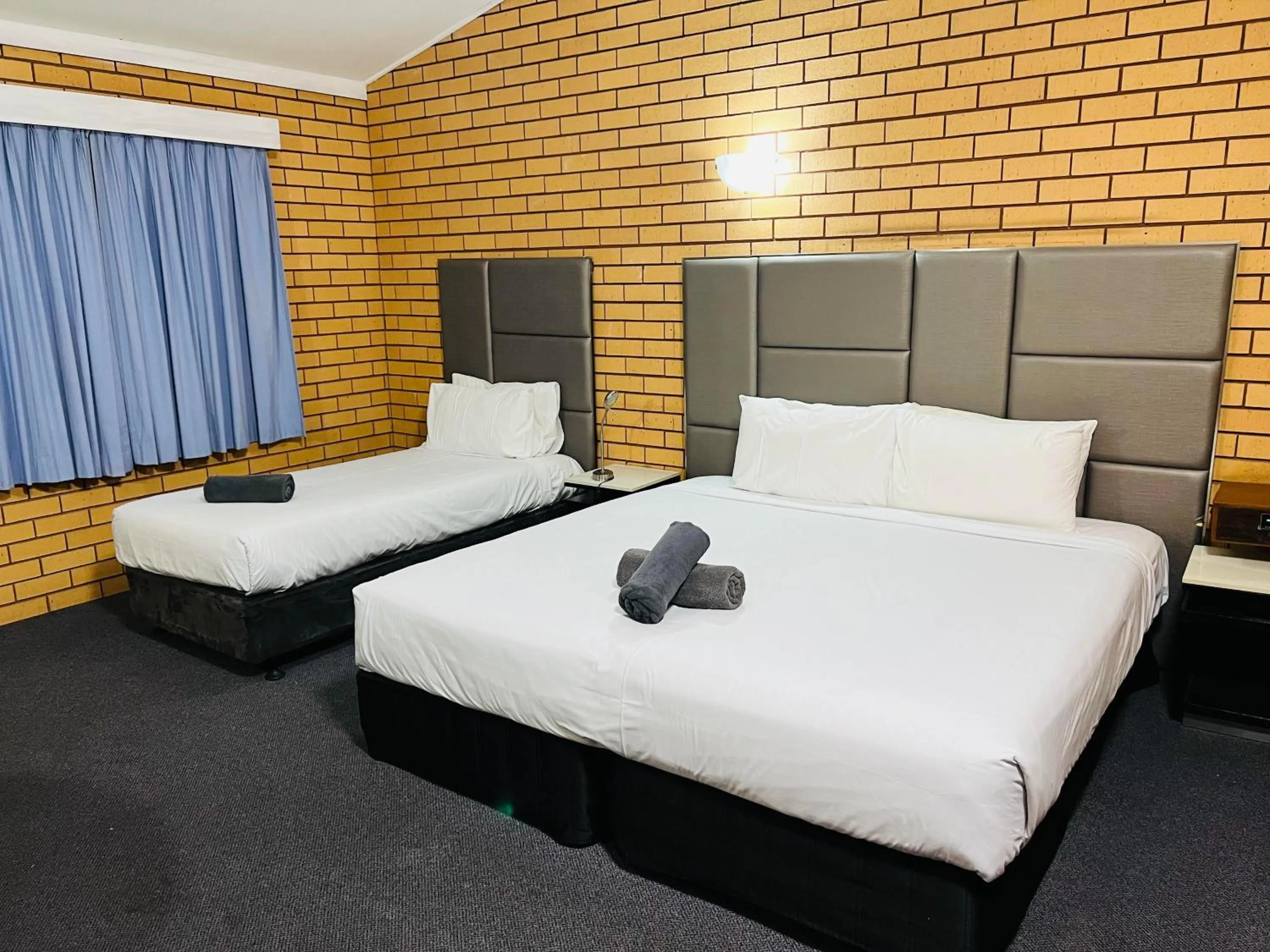 Bed in Stockman Motor Inn