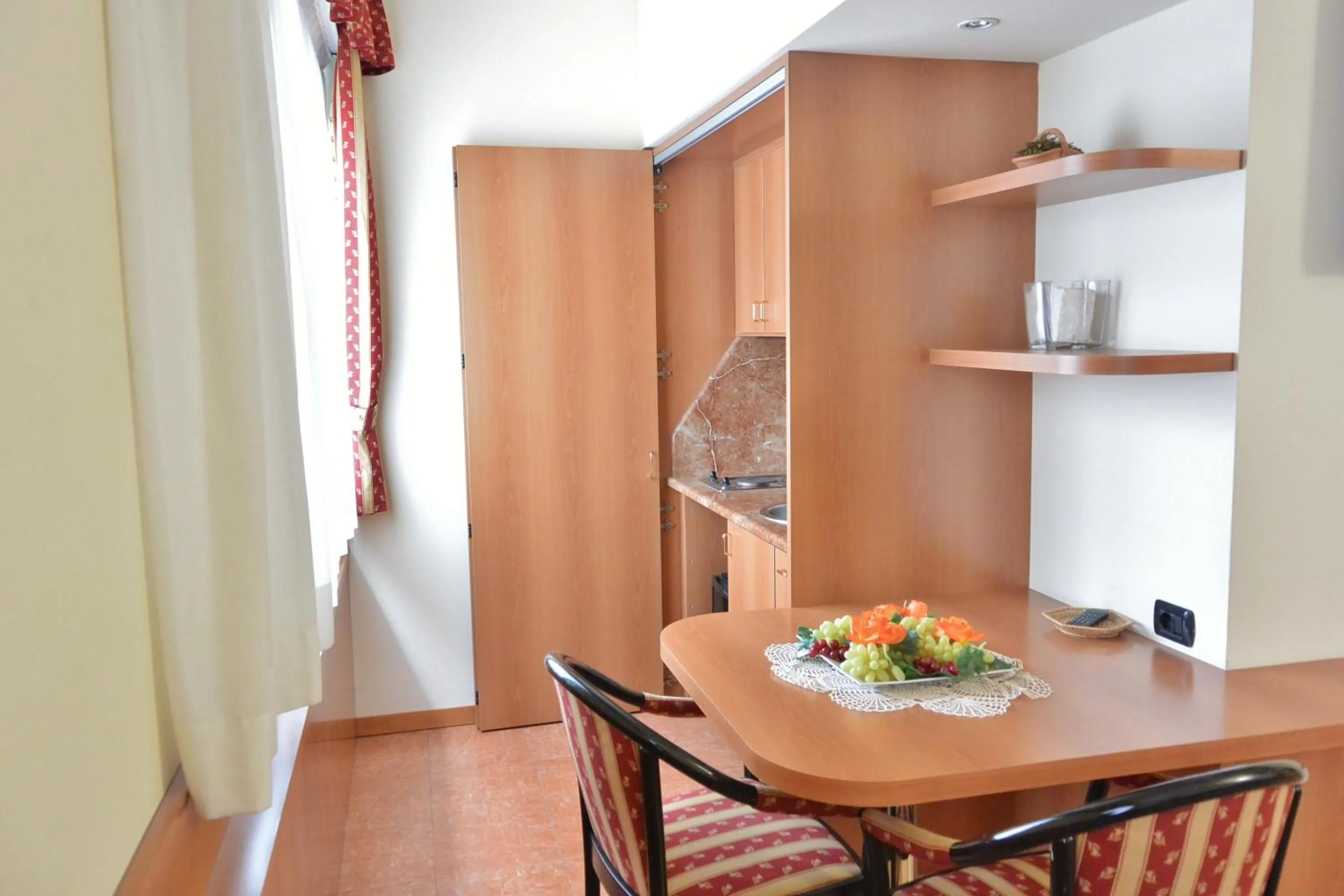 Kitchen or kitchenette in Melas Hotel