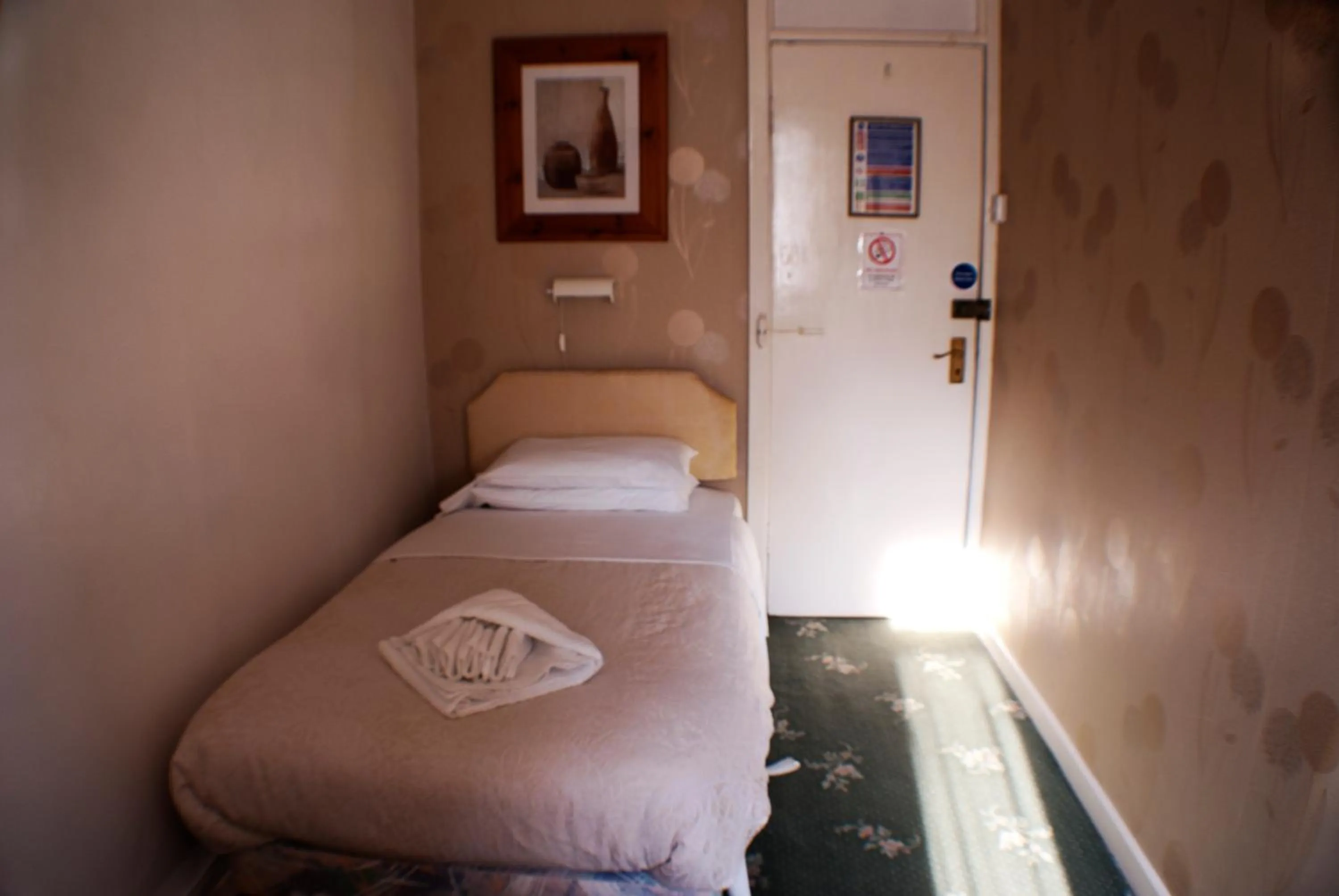 Bed in The Highfield Private Hotel