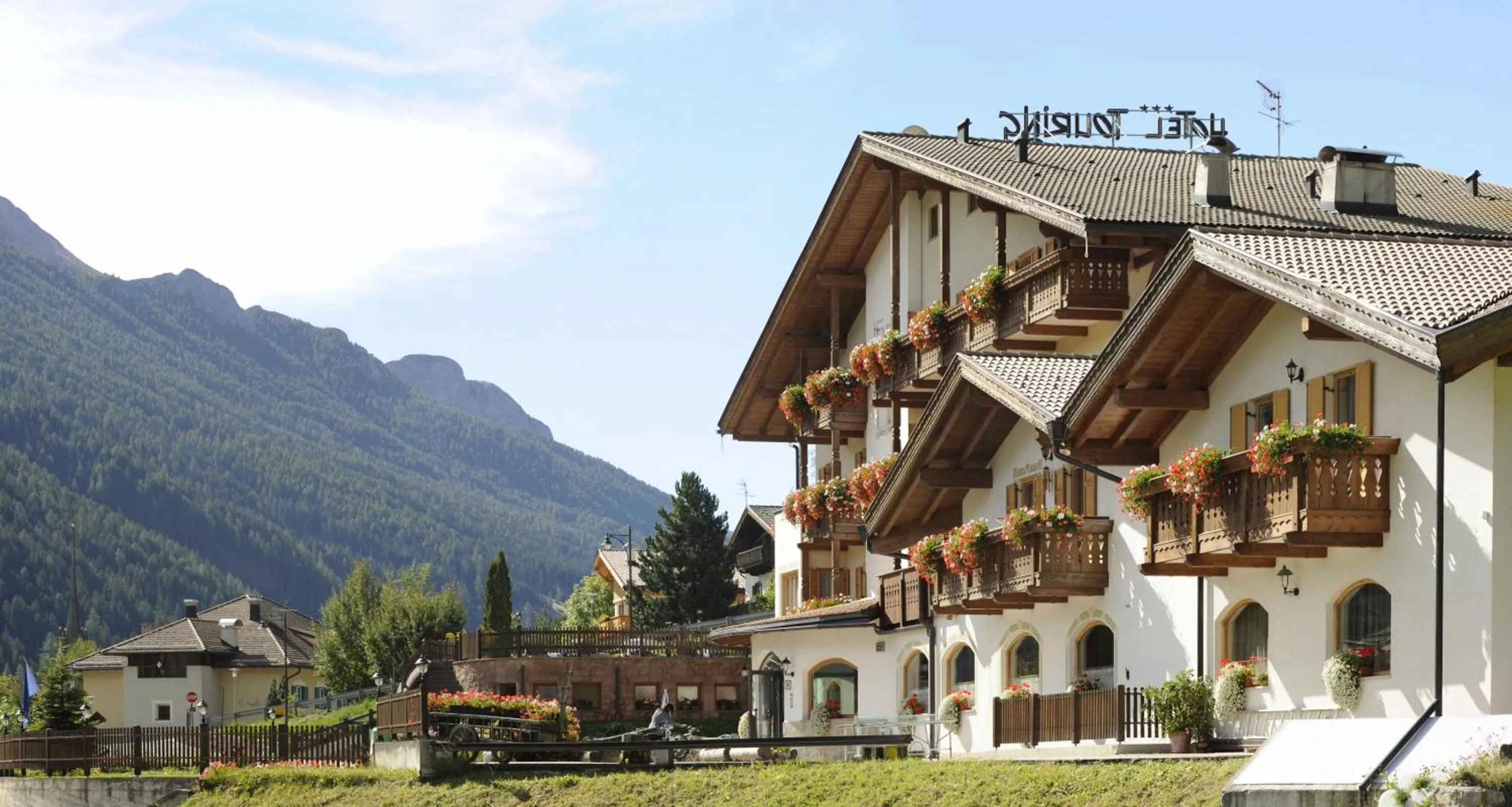Property building in Alpine Touring Hotel-petfriendly