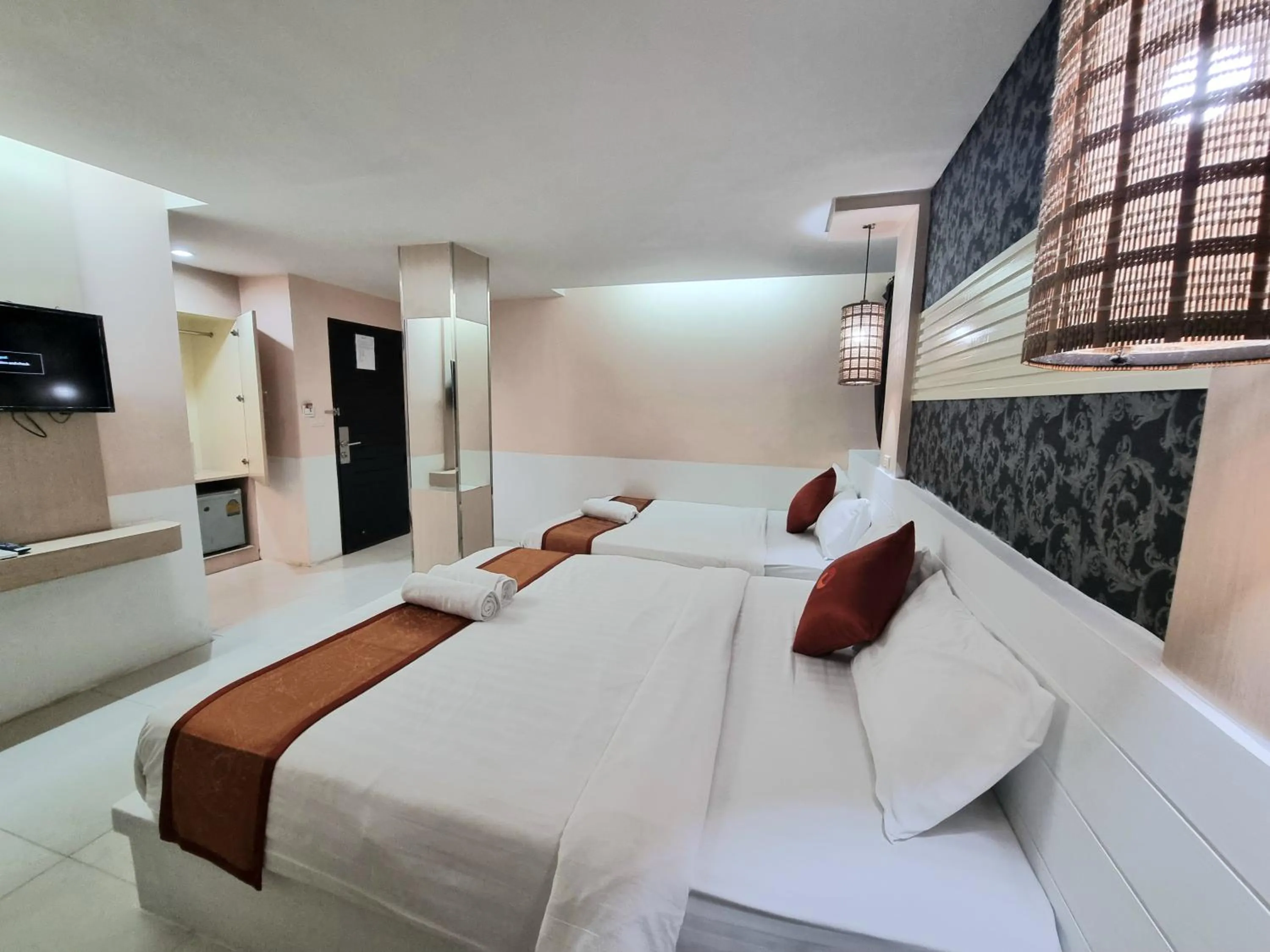 Photo of the whole room, Bed in Cozi Inn Hotel, Bangkok