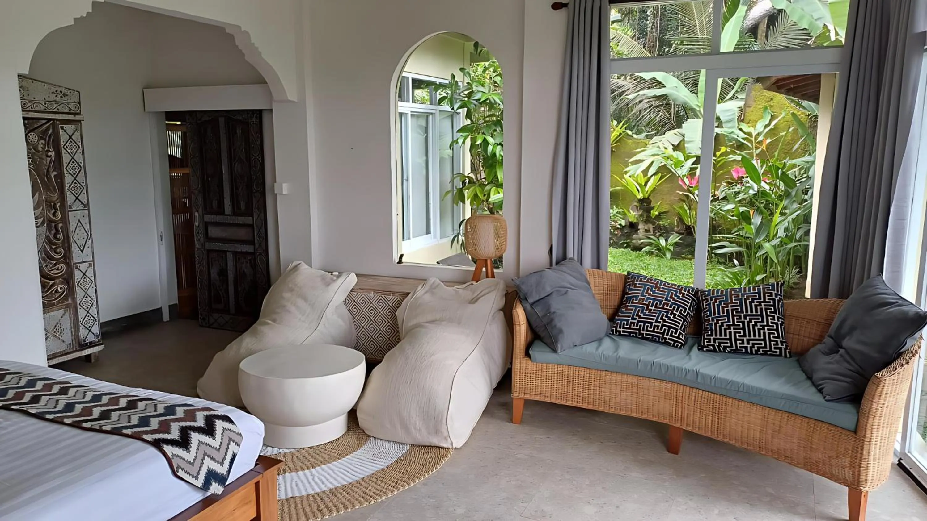 Living room, Bed in Tirta Asri Ubud Villa