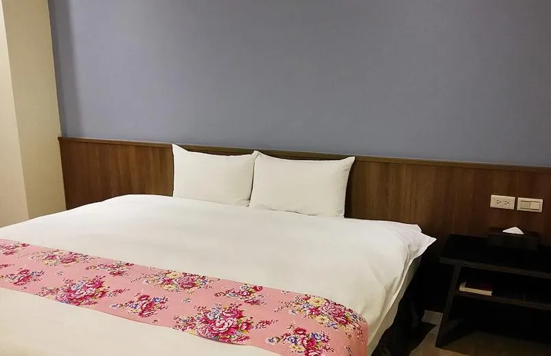 Bed in Sendale Zhubei Business Hotel