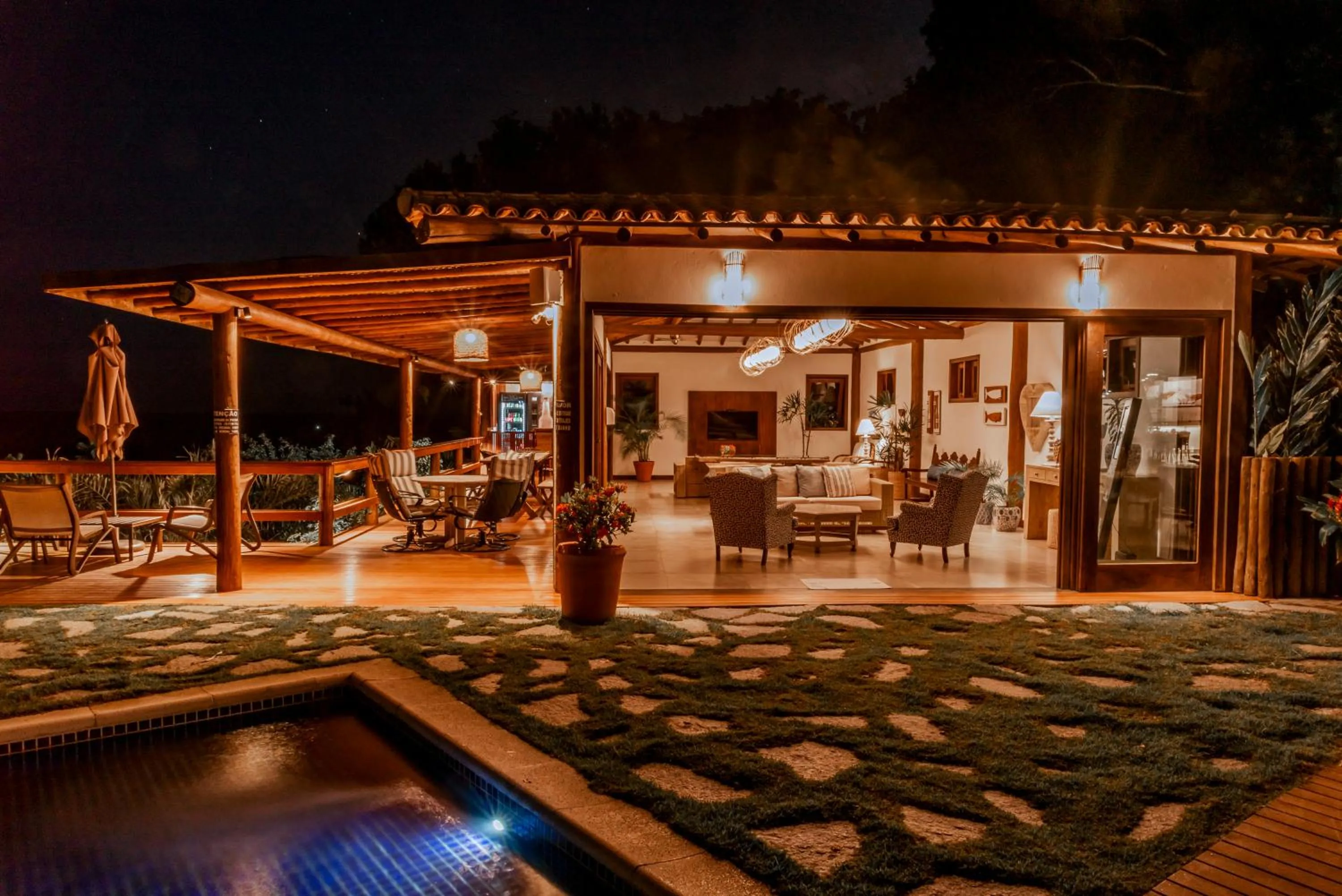 Communal lounge/ TV room in Manacá Pousada Parque