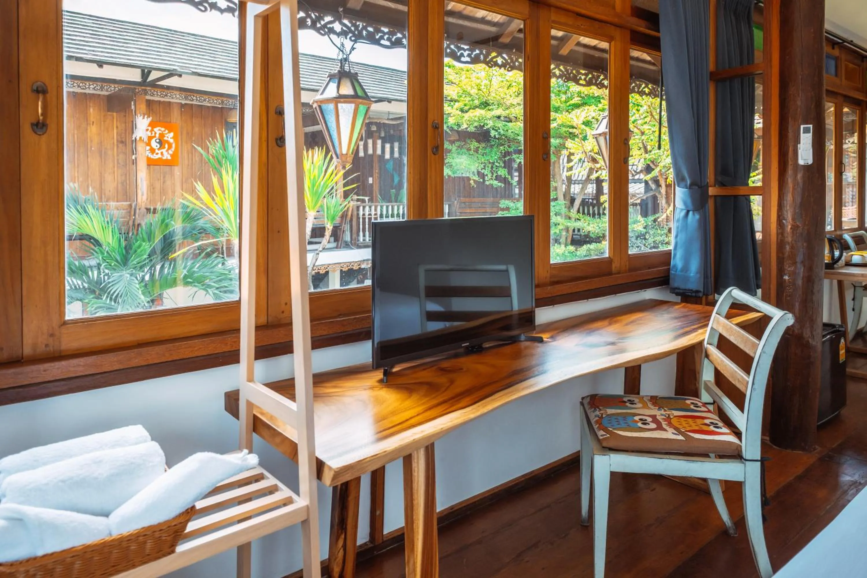 Communal lounge/ TV room in Pao Come Boutique House