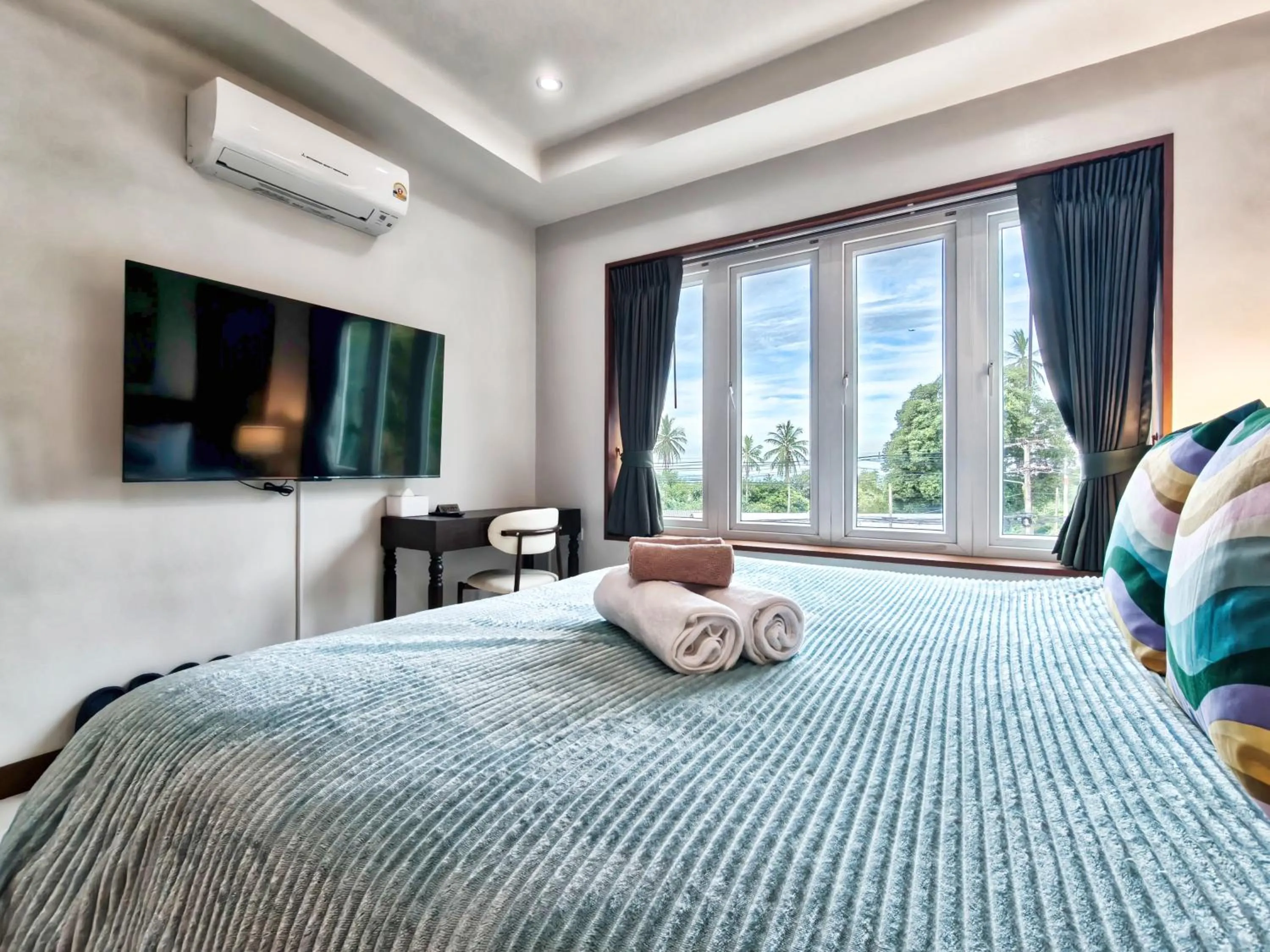 Bed in Surisa Seaview Pool Villas