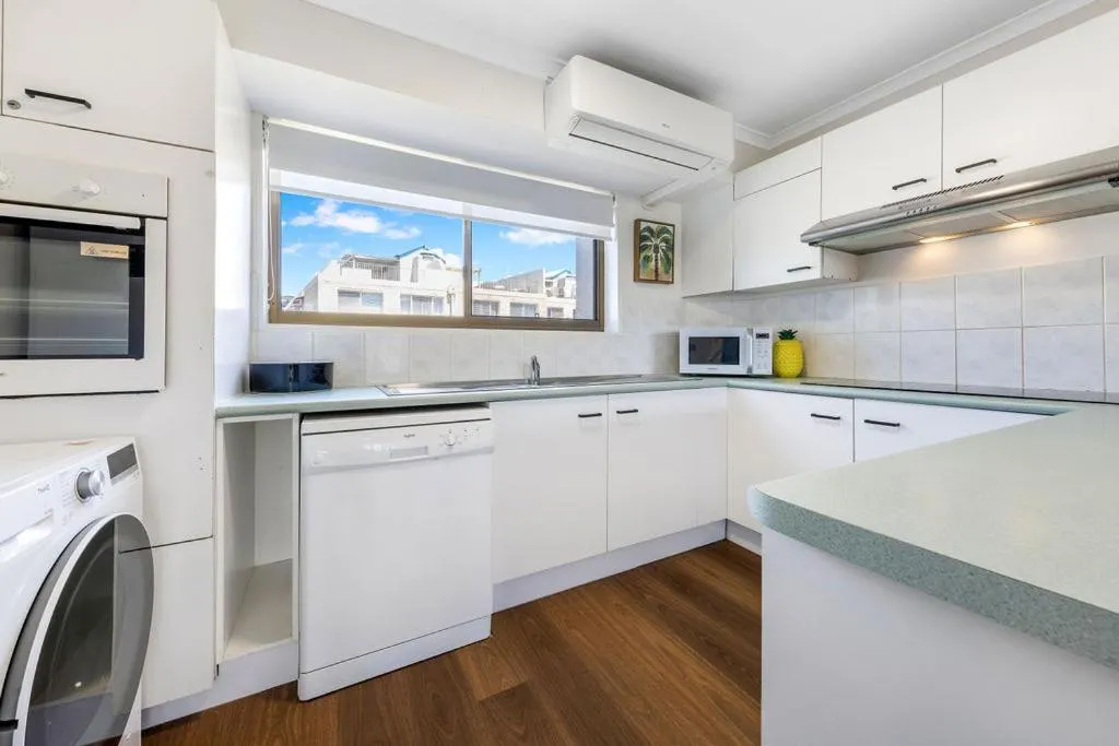 Kitchen or kitchenette in Kalua Holiday Apartments