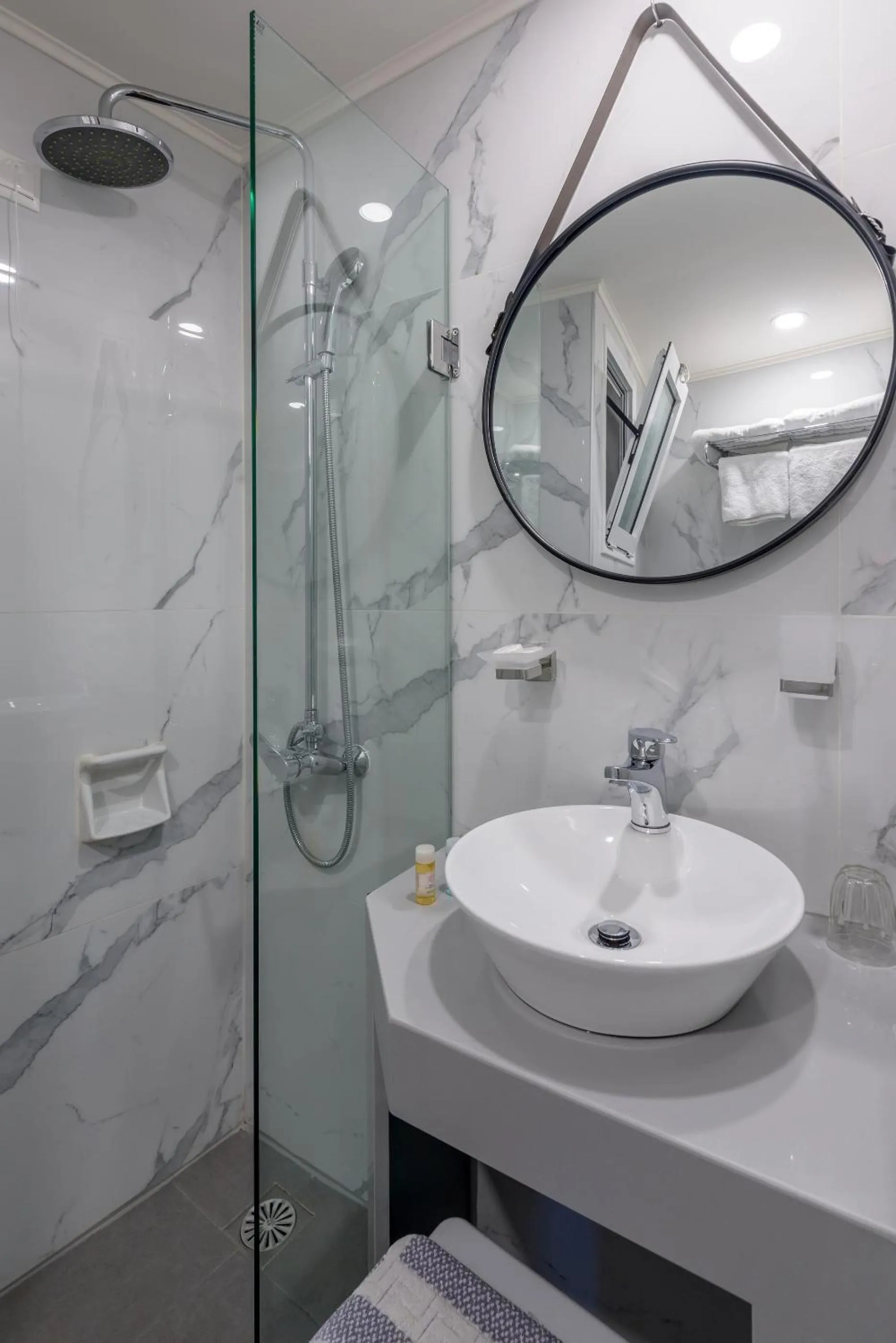 Bathroom in El Greco Hotel