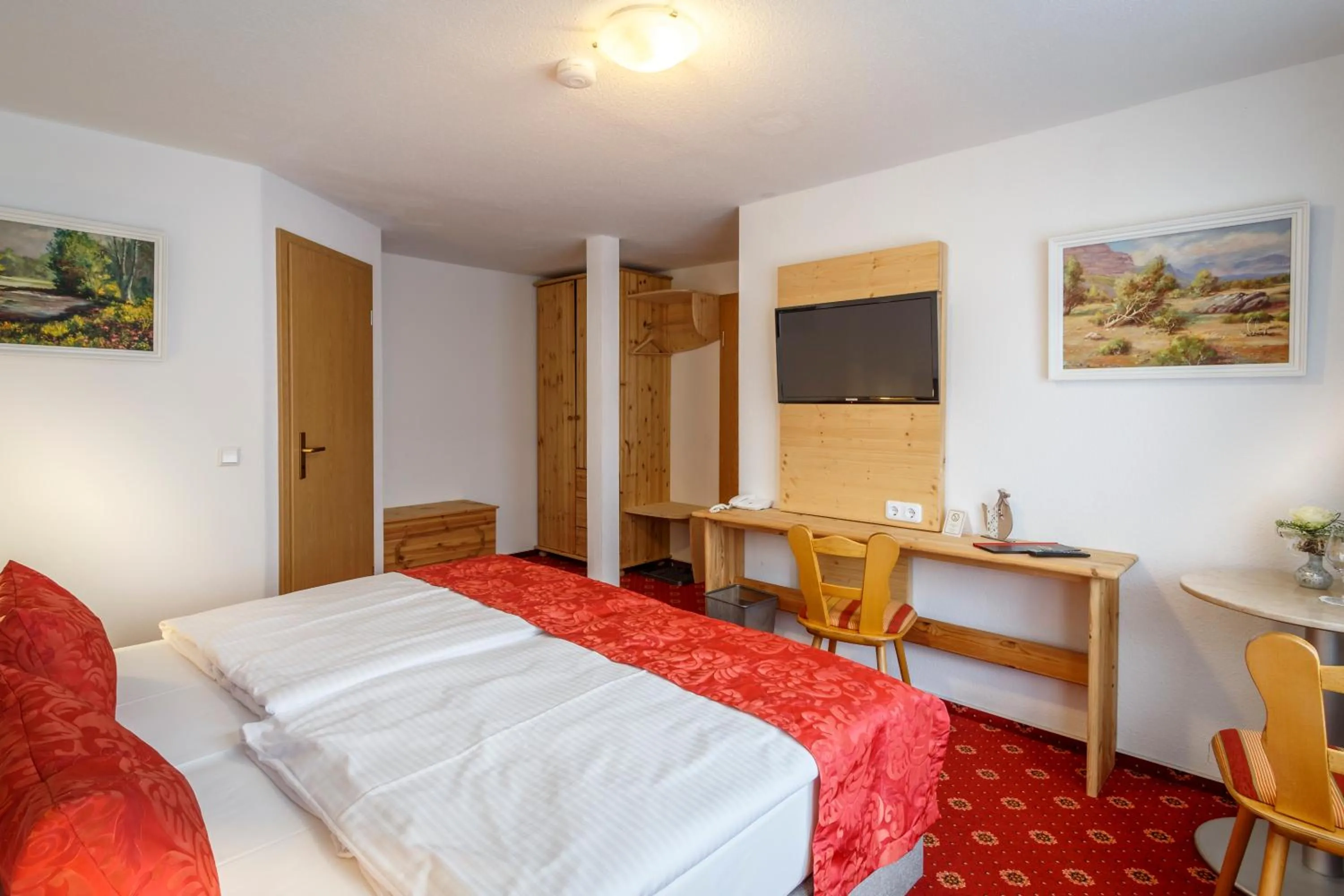 Photo of the whole room, Bed in Landhotel Bartlehof