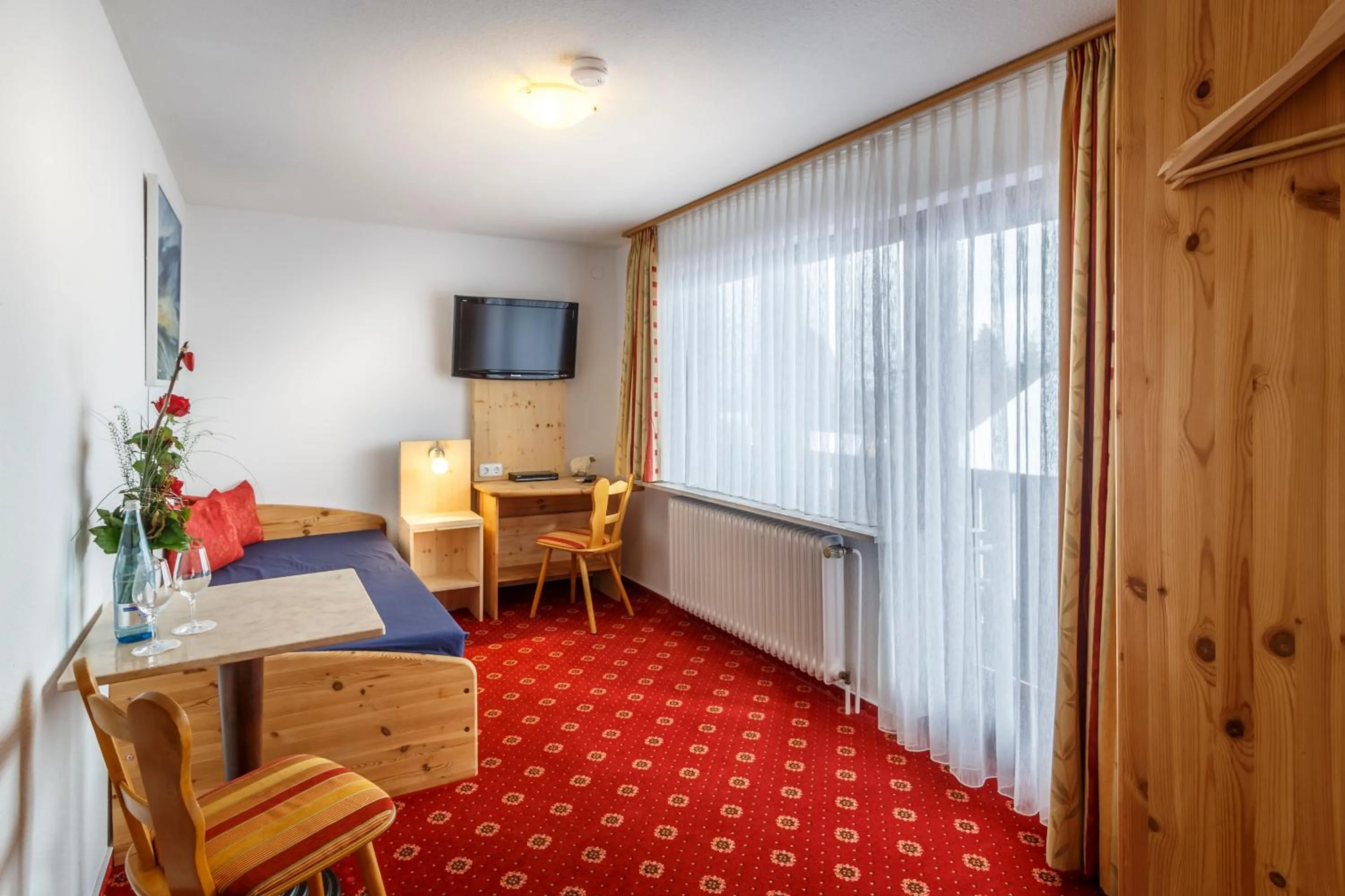 Photo of the whole room, Bed in Landhotel Bartlehof