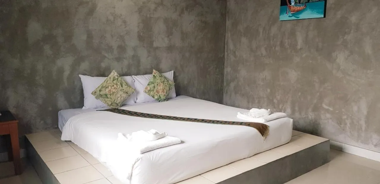 Bed in The Guest Hotel Krabi