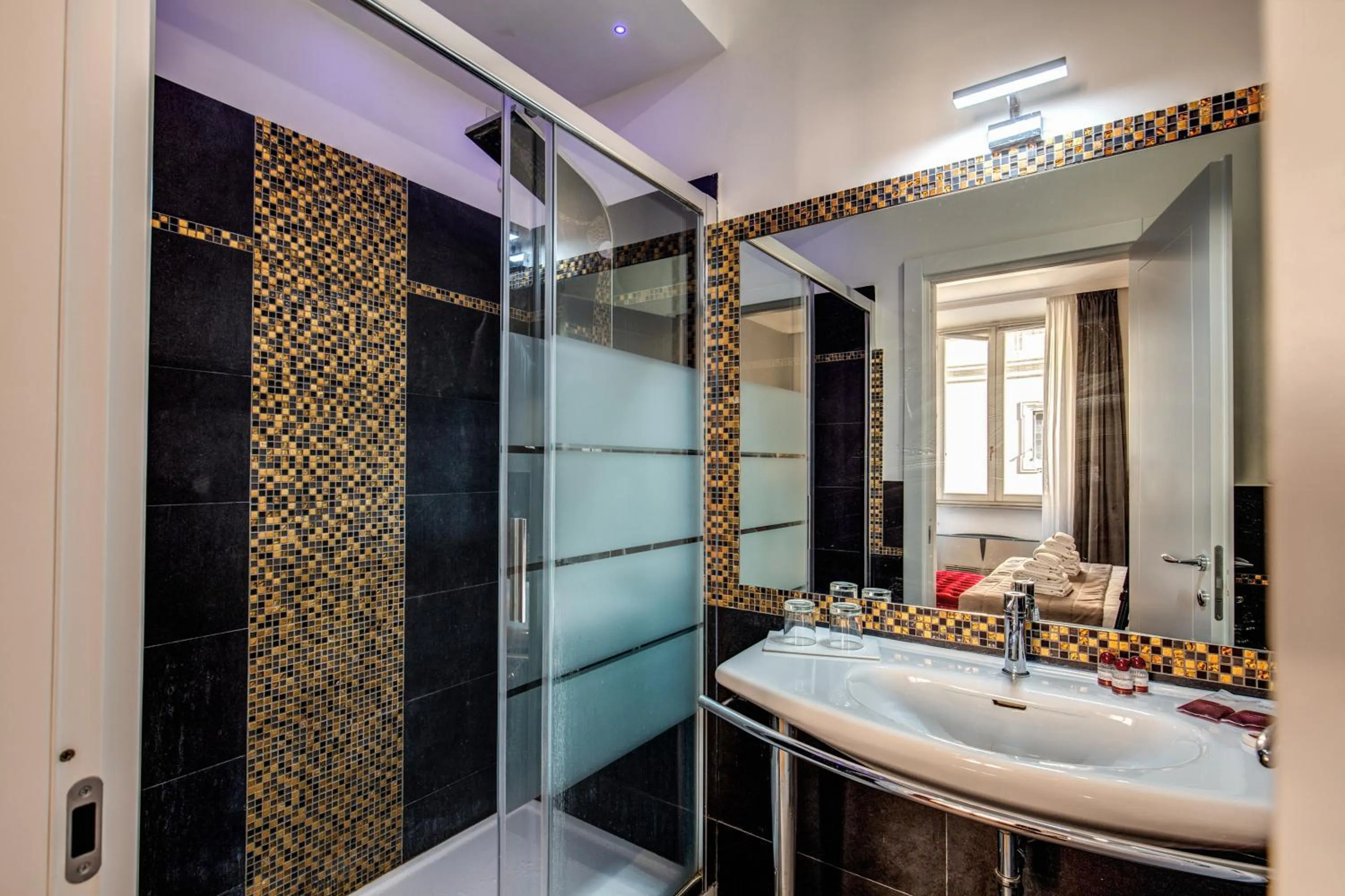 Bathroom in La Foresteria Luxury Suites