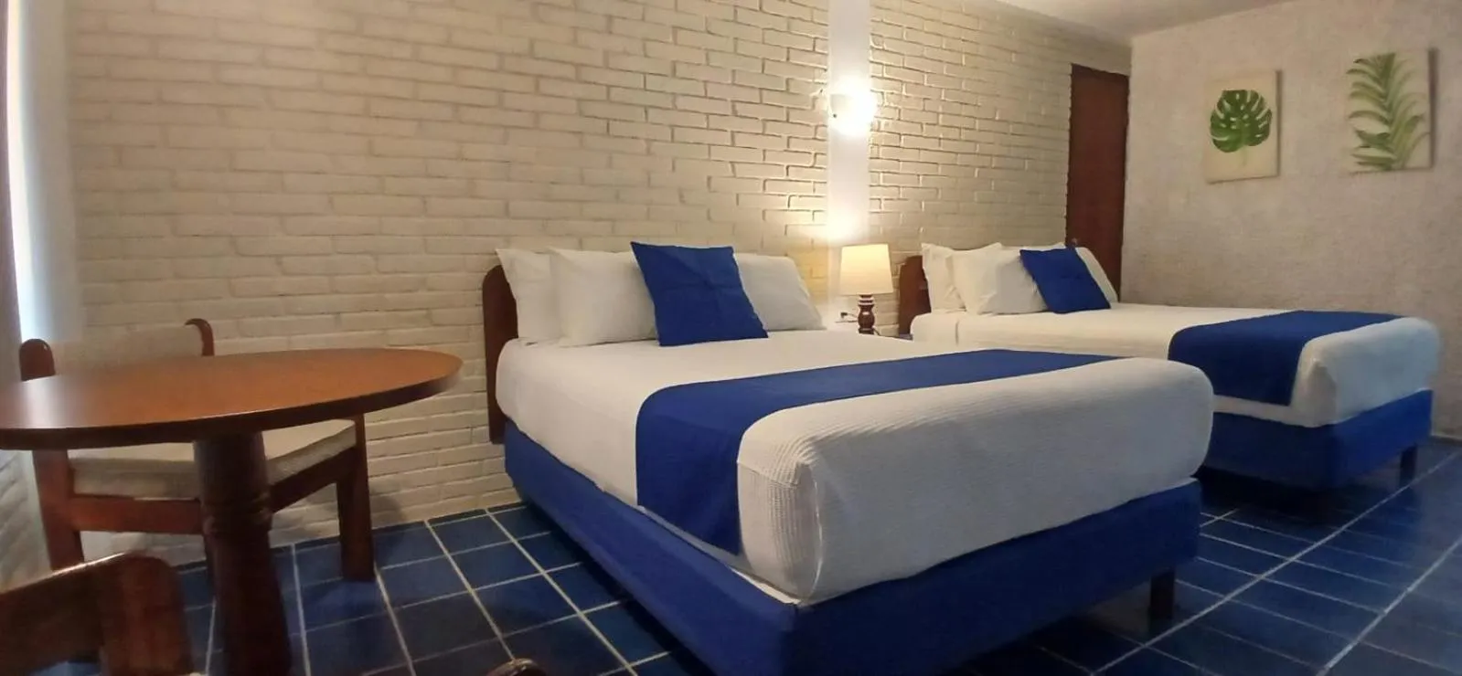 Bed in Hotel Plaza Palmas