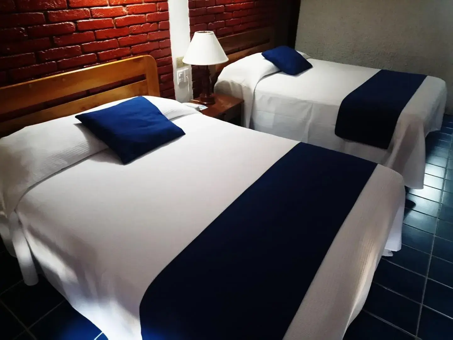 Quadruple Room with Bathroom in Hotel Plaza Palmas Quadruple Room with Bathroom in Hotel Plaza Palmas