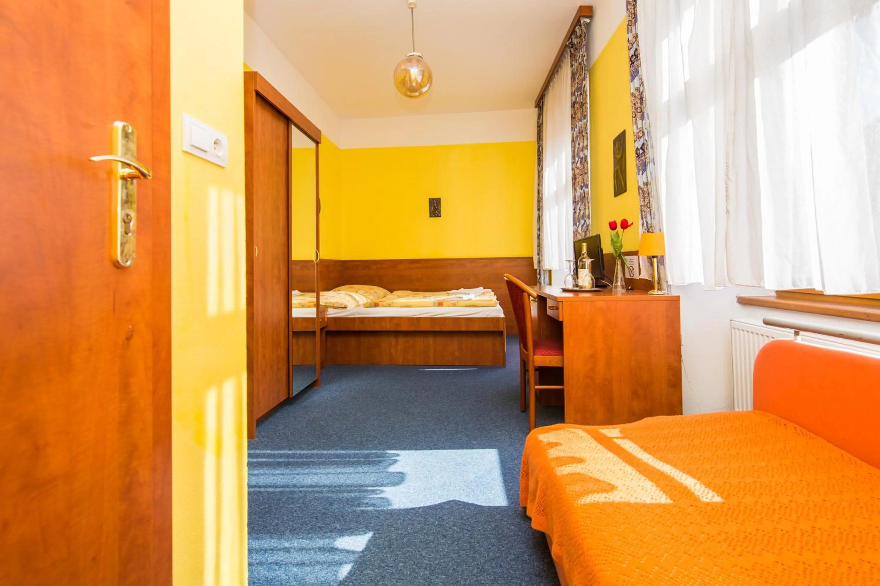 Seating area, Bed in Hotel Morava