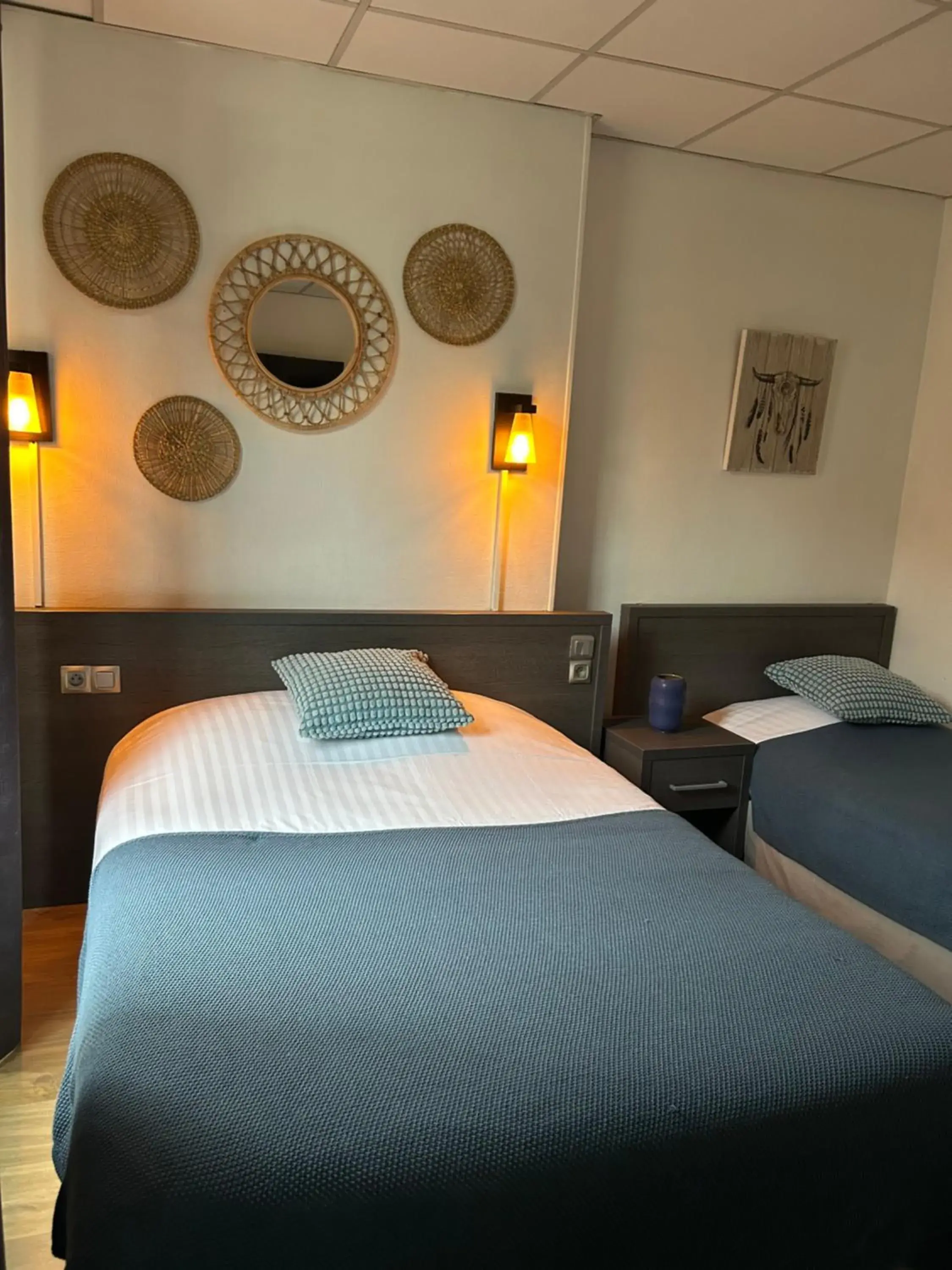 Triple Room with Courthouse View in Les Initiés Triple Room with Courthouse View in Les Initiés