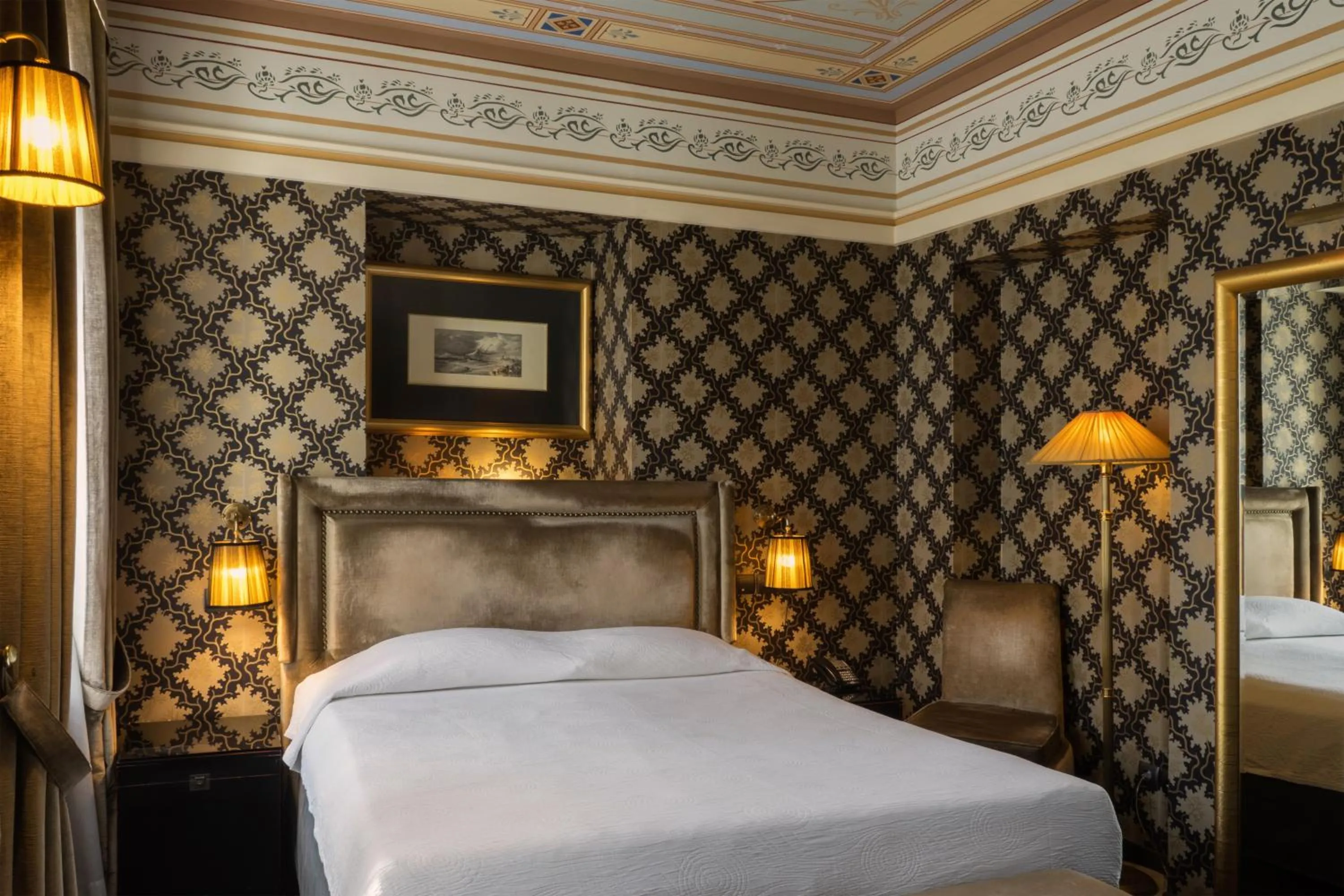 Bed in Maison Grecque Hotel Extraordinaire