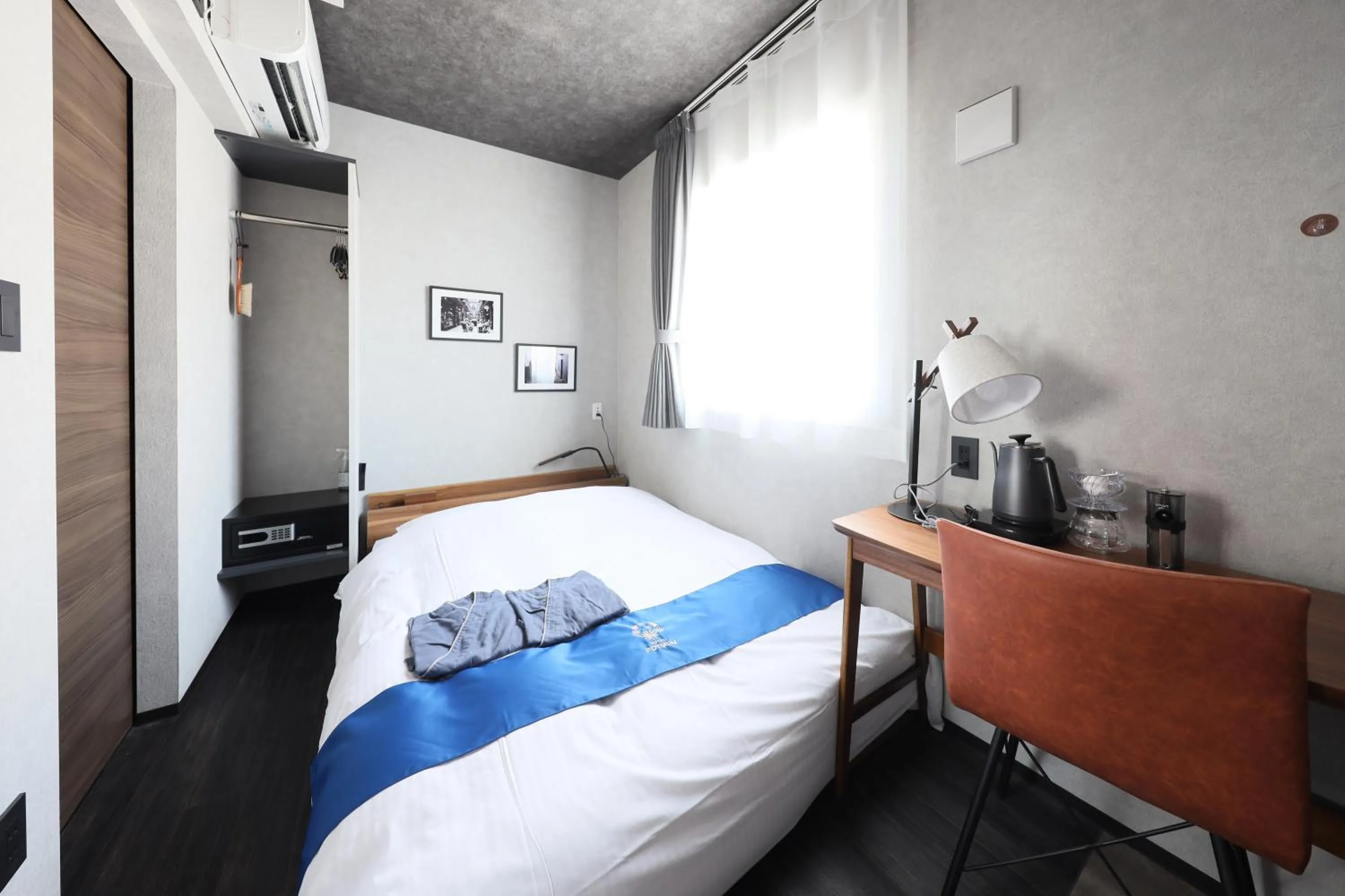 Photo of the whole room, Bed in Hotel Potmum Sapporo