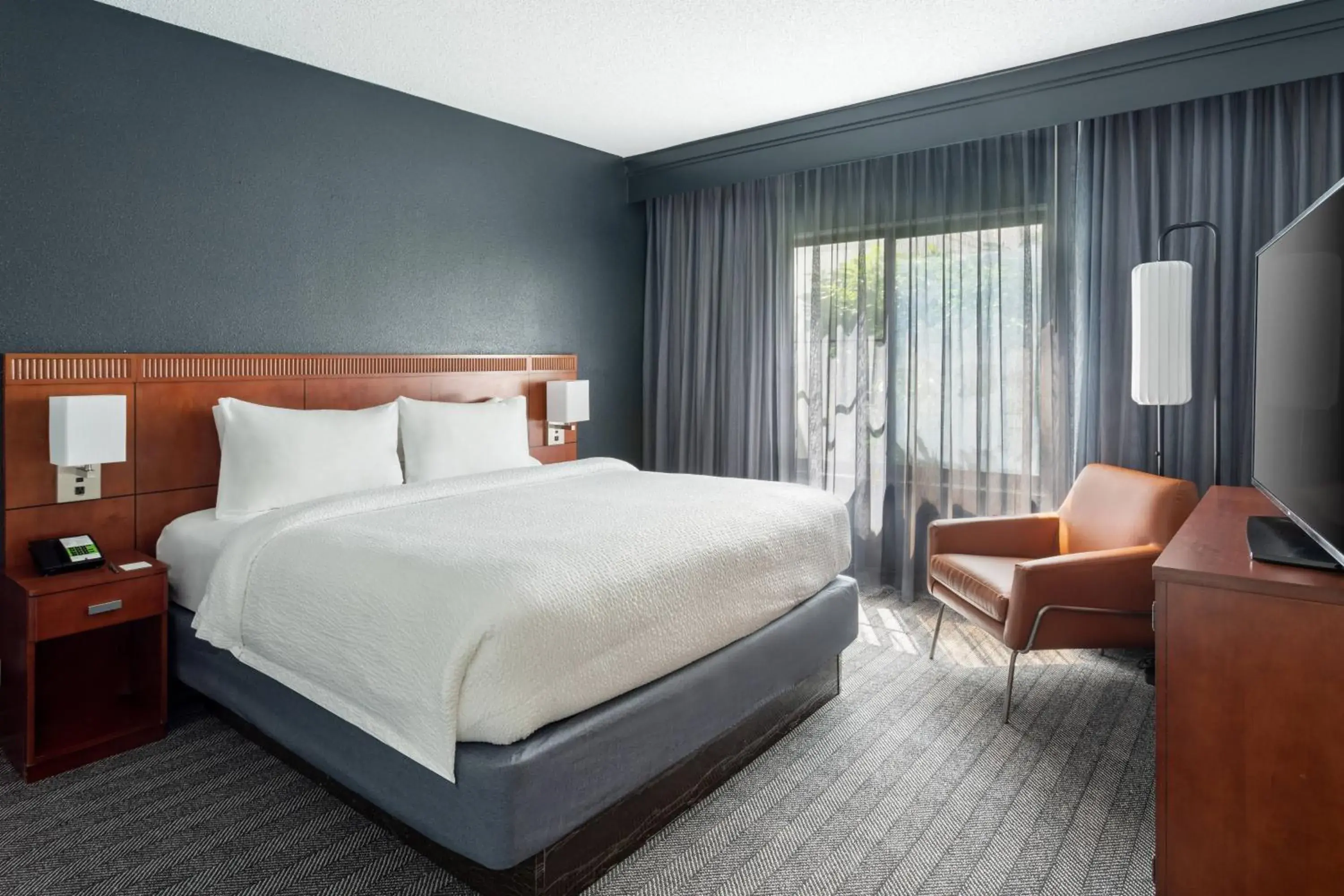 Guest room, 1 King, Sofa bed, Courtyard view in Courtyard by Marriott West Palm Beach Guest room, 1 King, Sofa bed, Courtyard view in Courtyard by Marriott West Palm Beach