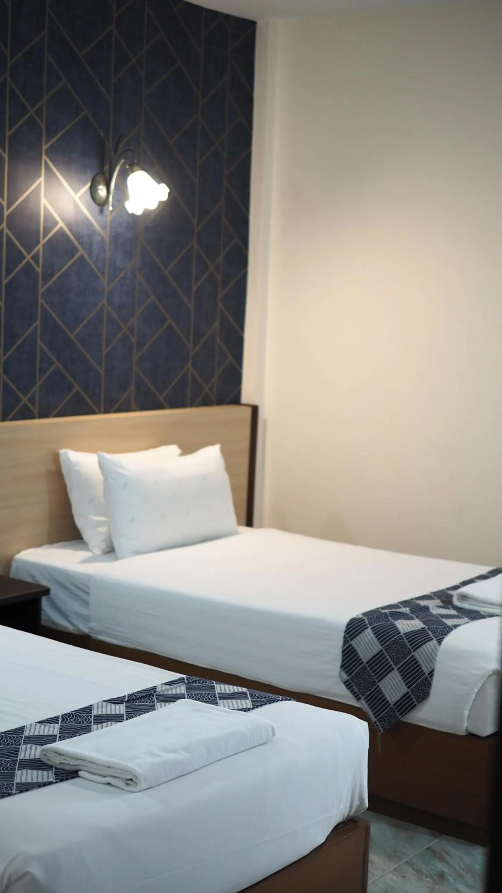 Bed in Luckswan Boutique Chiang Rai - SHA Extra Plus