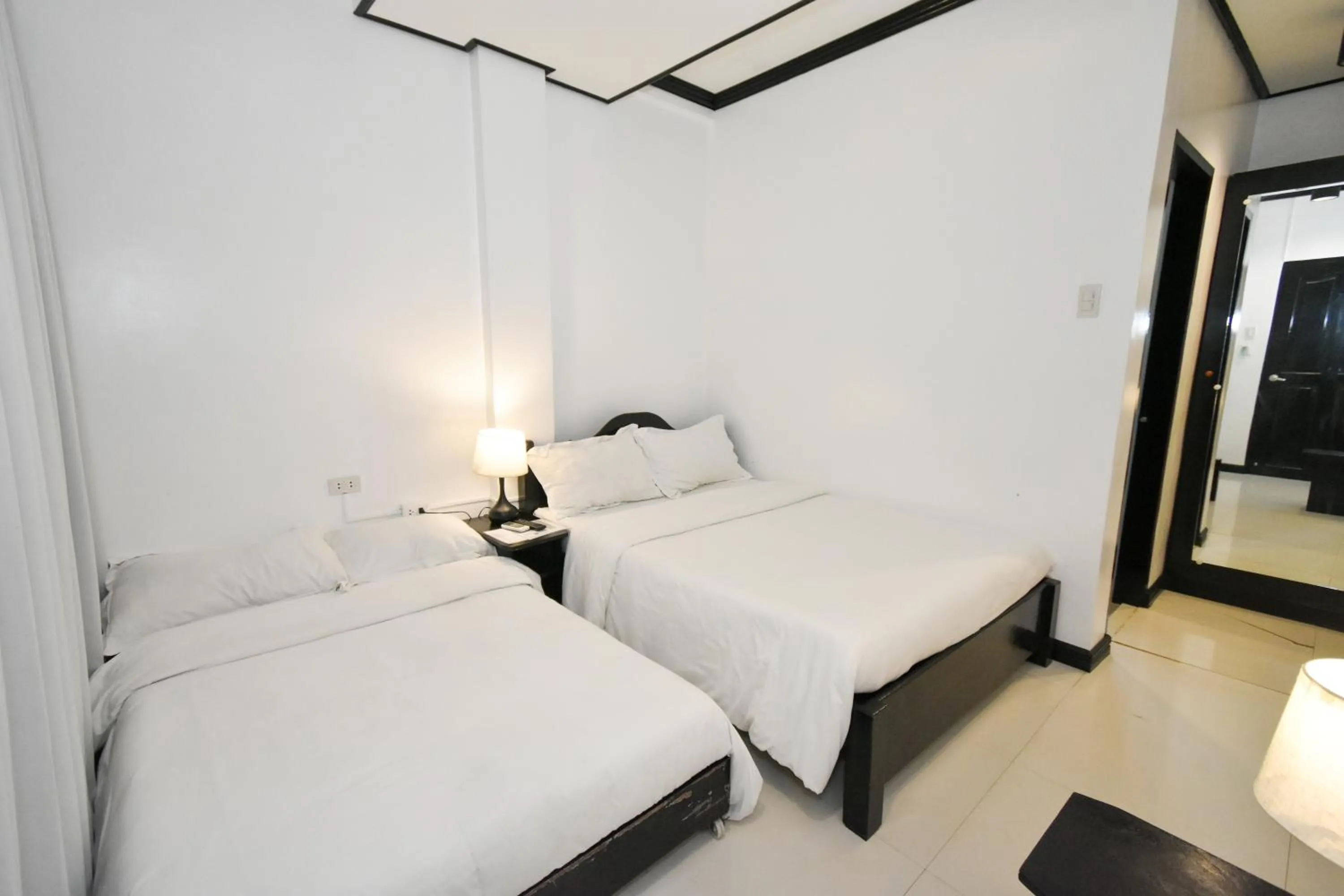 Bed in Swiftlets Inn