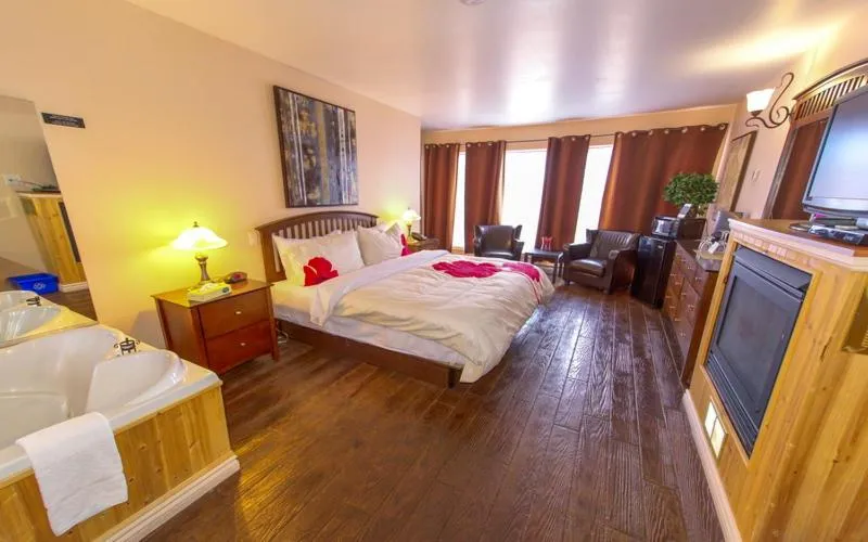 Bed in Auberge Hotel Spa Watel