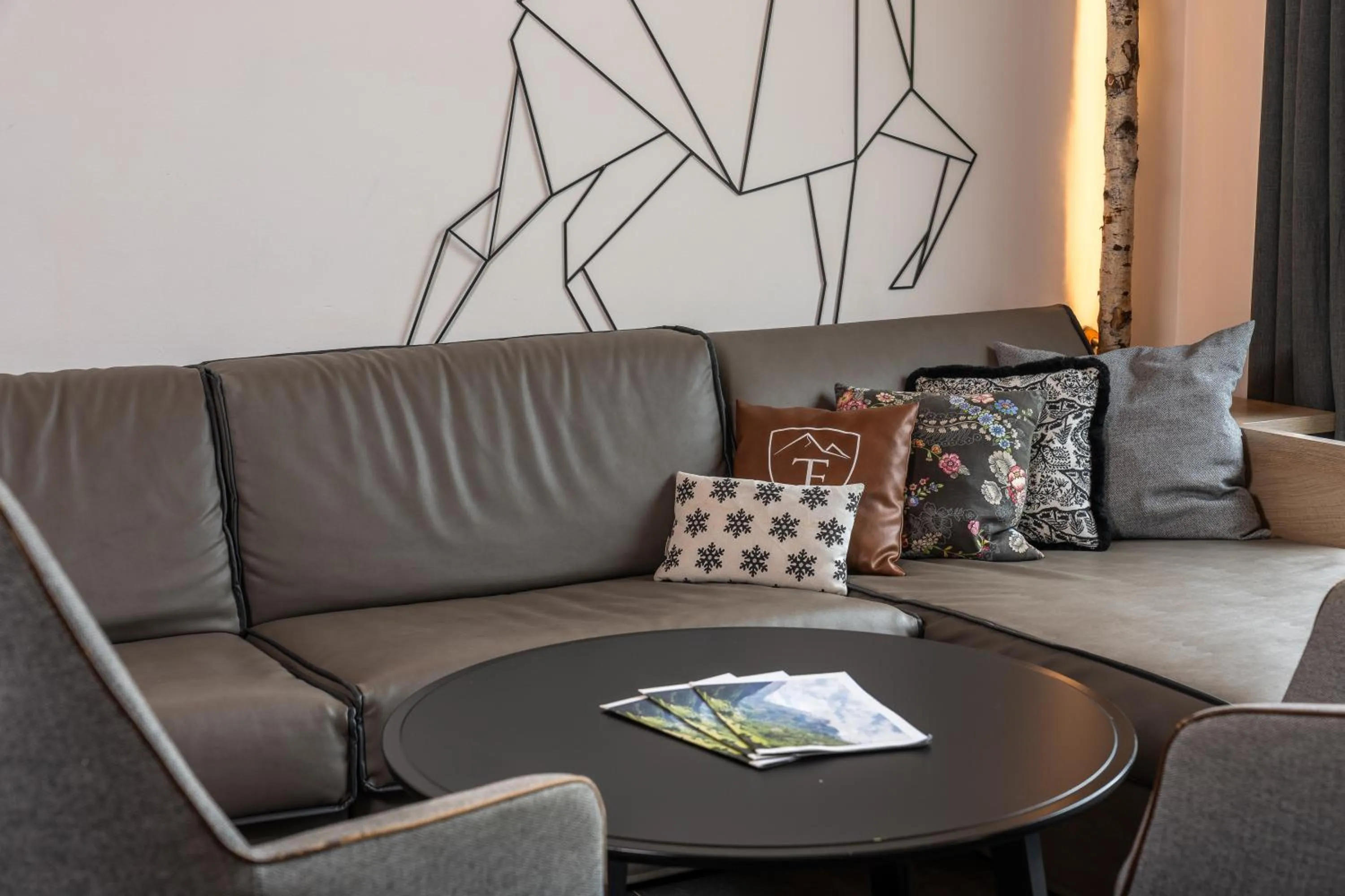 Seating area in 24 by AvenidA - Mountain Hotel