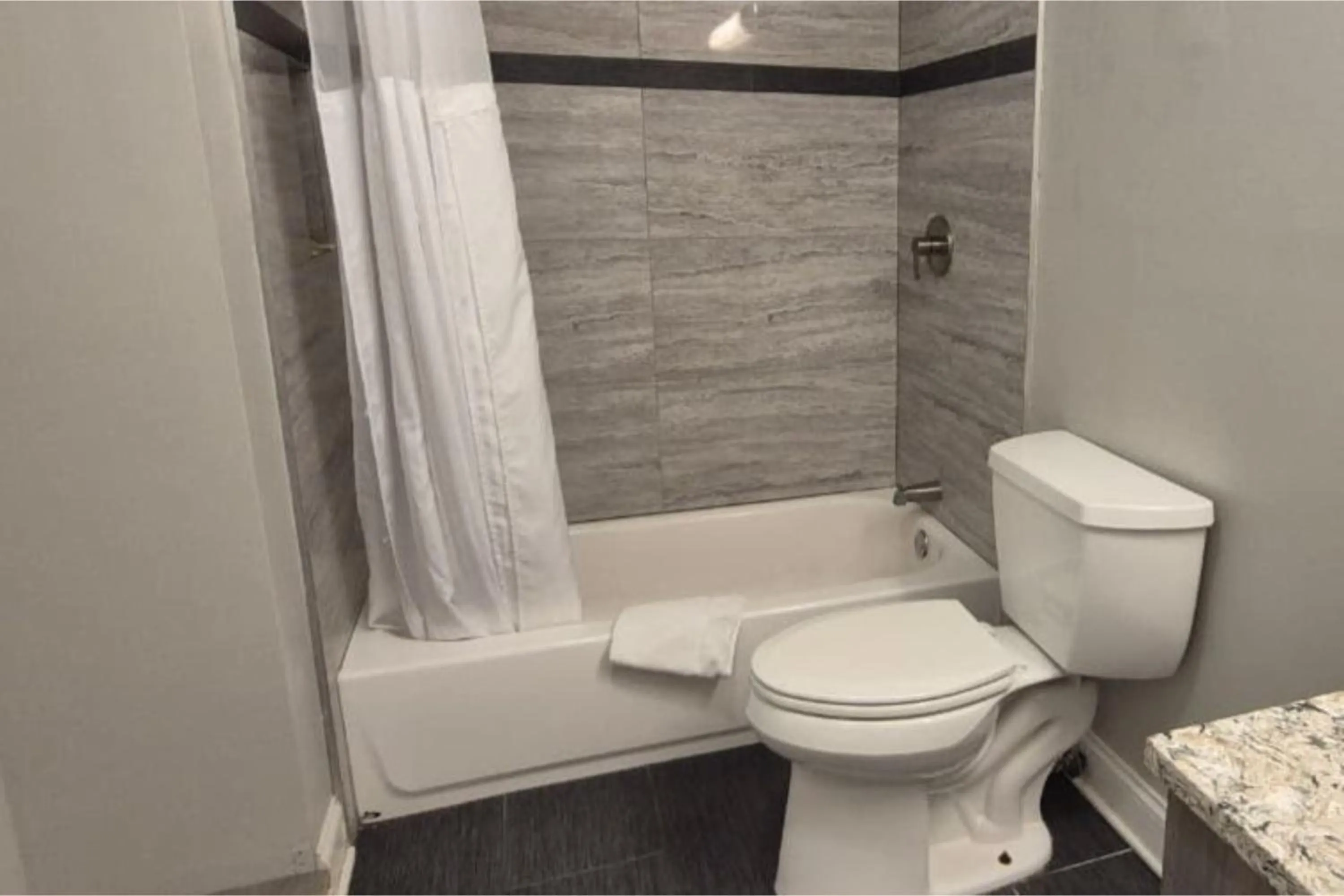Bathroom in Economy Inn Merrillville By Townhouse I 65