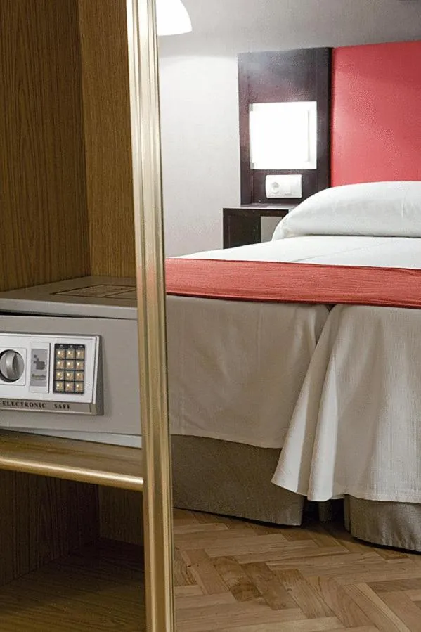 Photo of the whole room, Bed in Hostal Carlos III