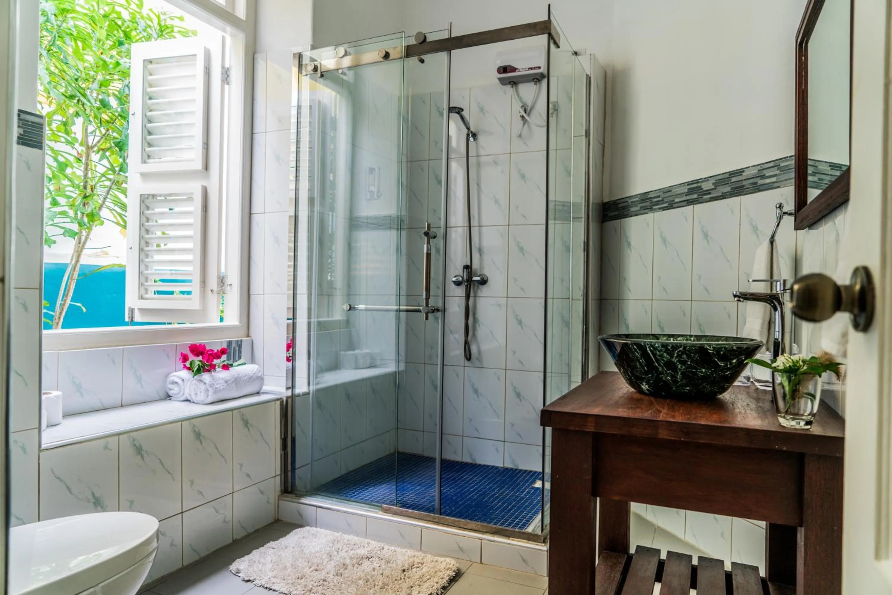 Bathroom in Bario Hotel