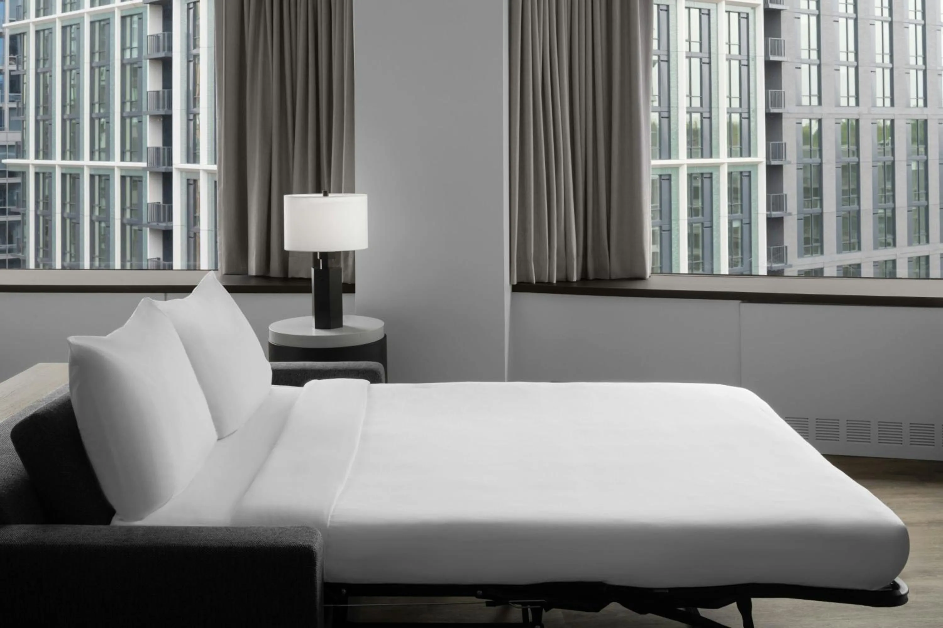 Photo of the whole room, Bed in AC Hotel Arlington National Landing