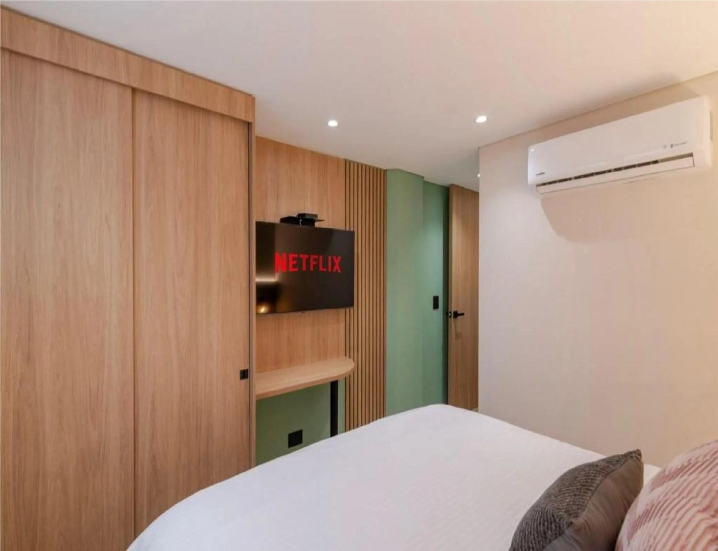 wardrobe, Bed in Obo Hotel